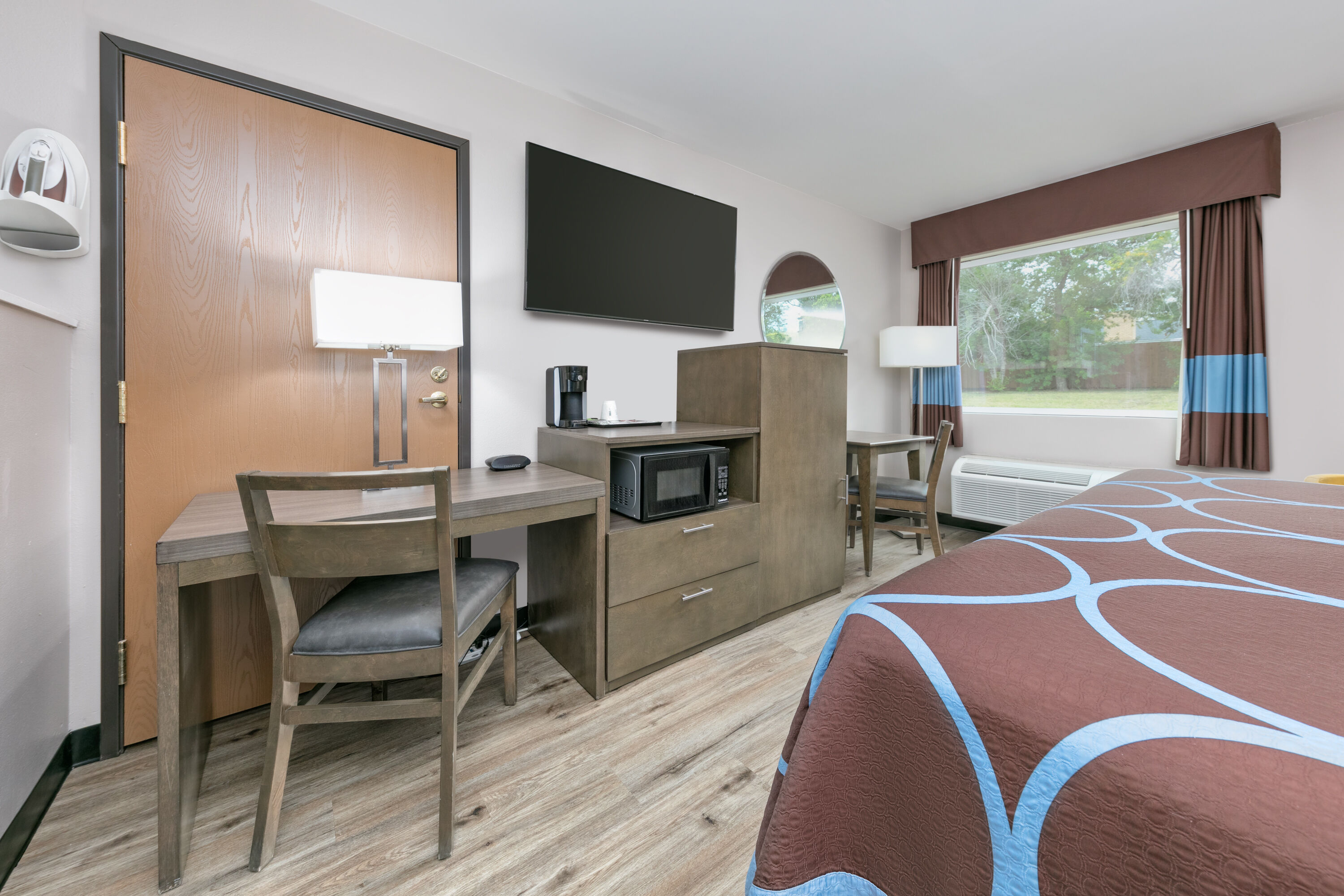 Guest room at the Super 8 by Wyndham Waxahachie TX in Waxahachie, Texas