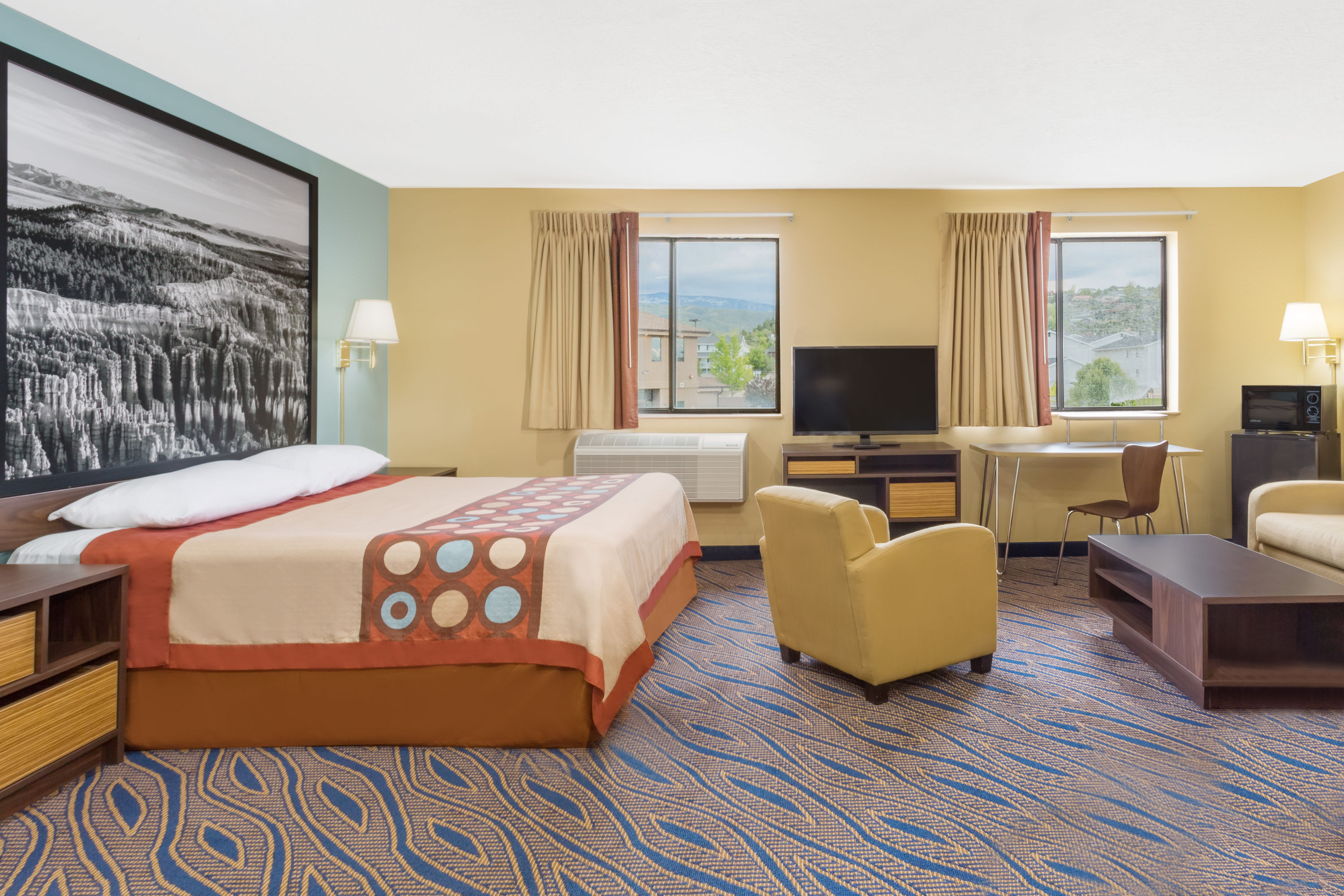 Guest room at the Super 8 by Wyndham Cedar City in Cedar City, Utah