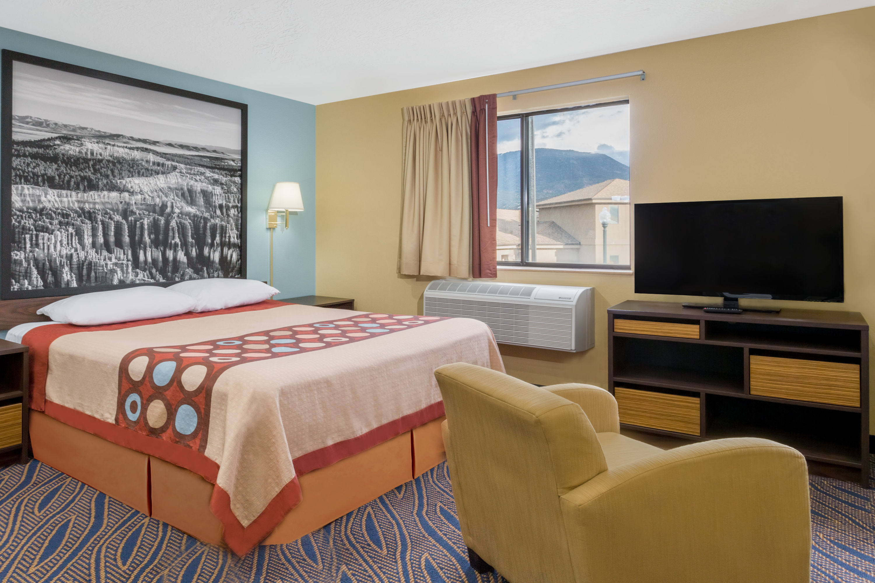 Guest room at the Super 8 by Wyndham Cedar City in Cedar City, Utah