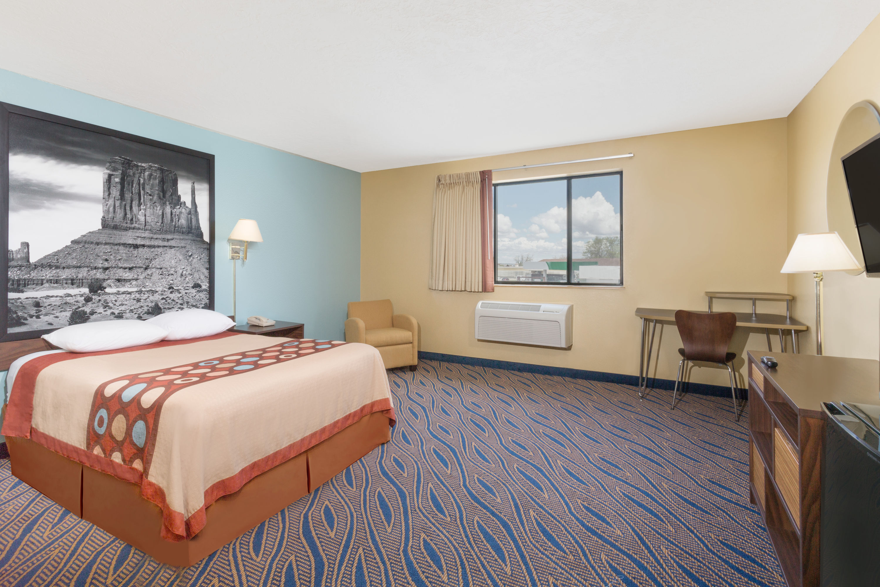 Guest room at the Super 8 by Wyndham Cedar City in Cedar City, Utah