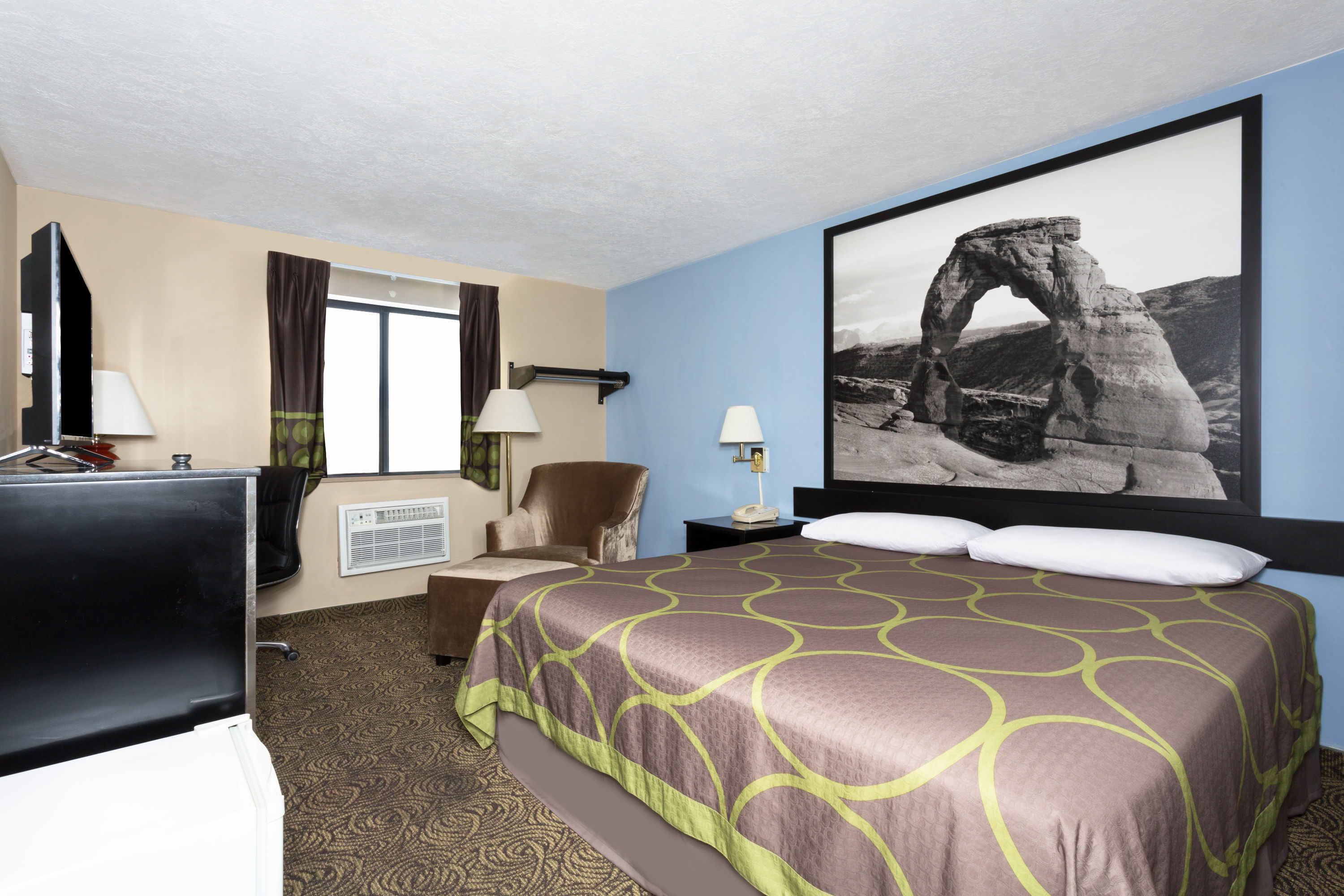 Guest room at the Super 8 by Wyndham Logan in Logan, Utah