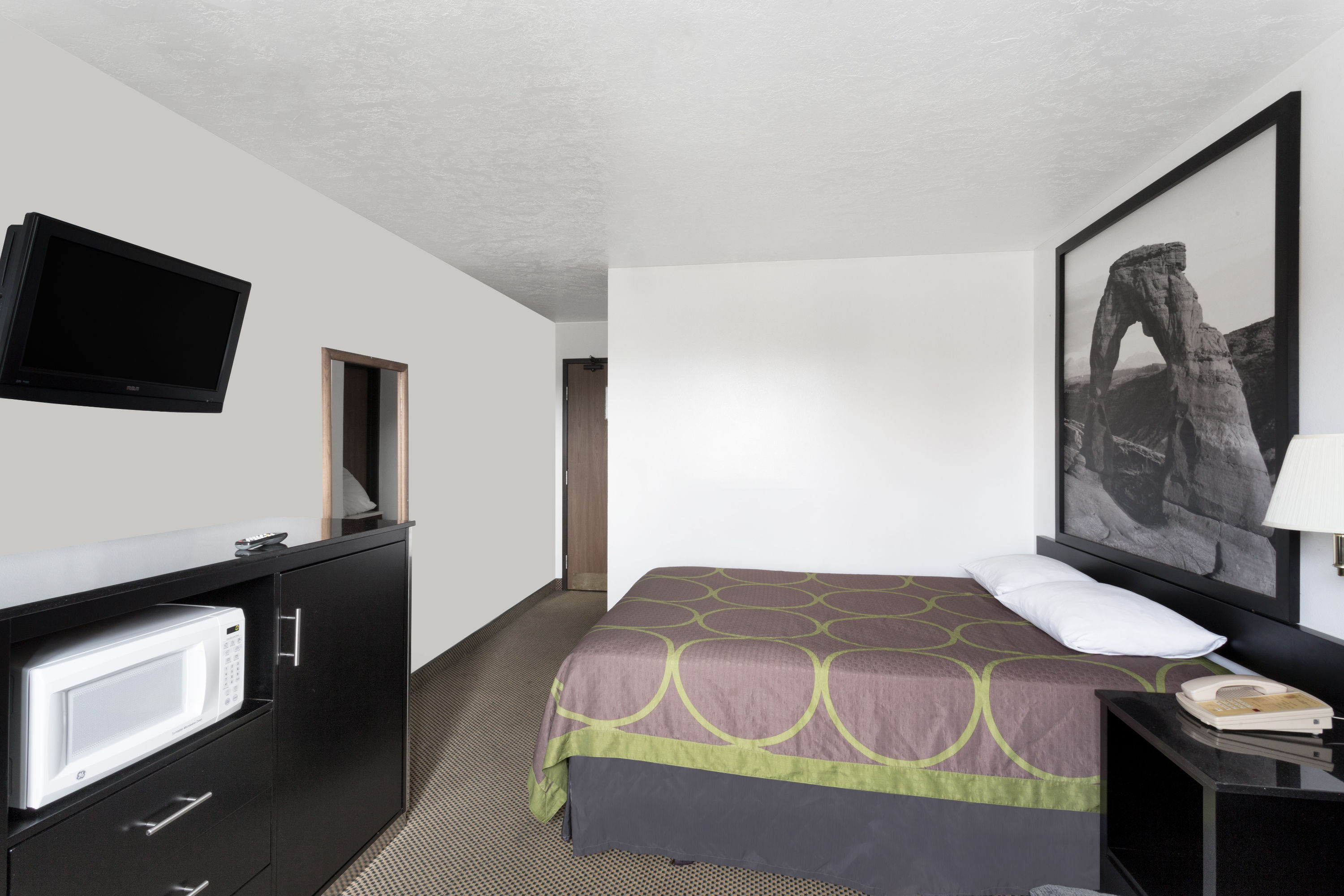 Guest room at the Super 8 by Wyndham Logan in Logan, Utah