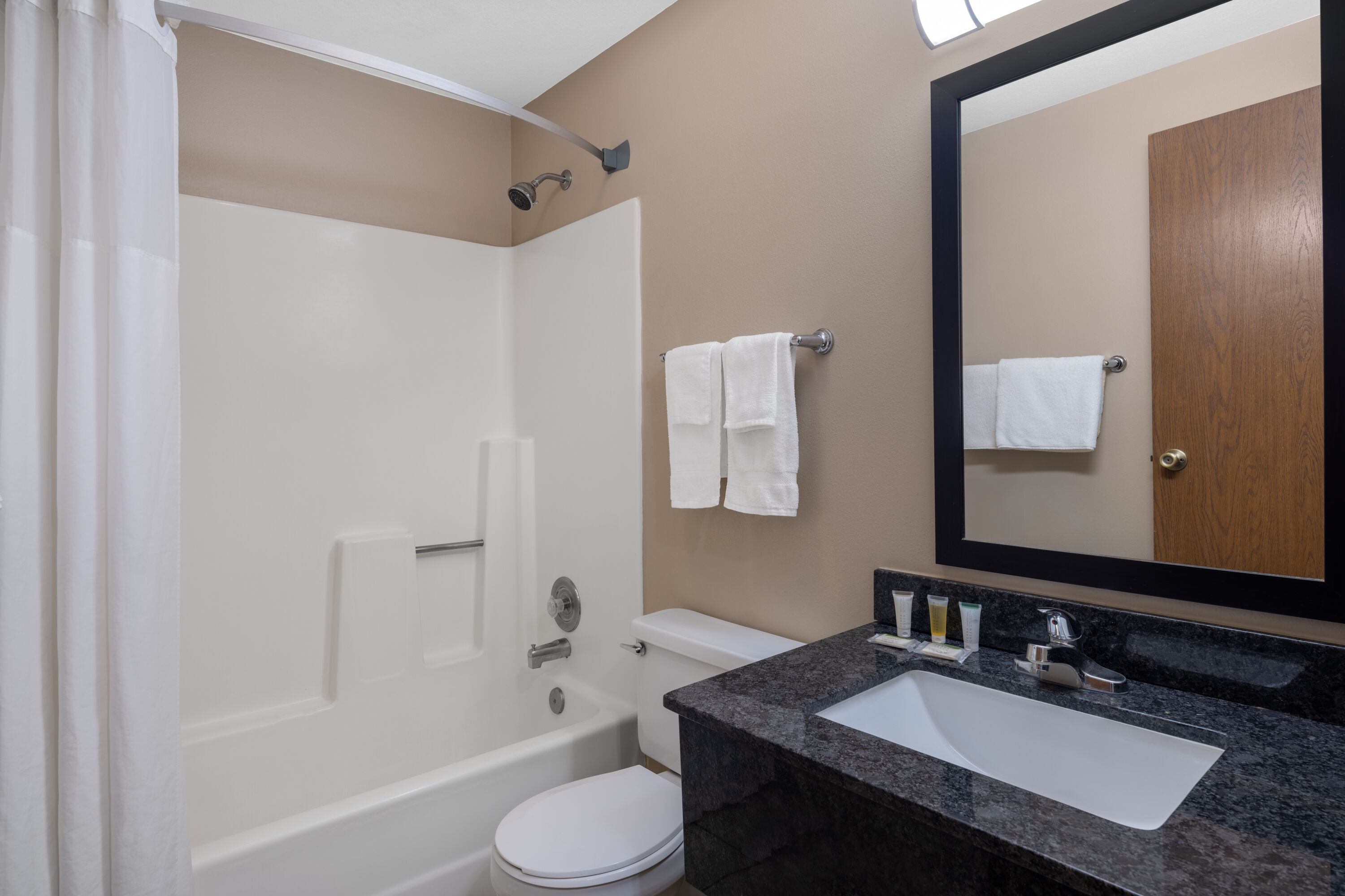 Guest room bath at the Super 8 by Wyndham Ogden in Ogden, Utah