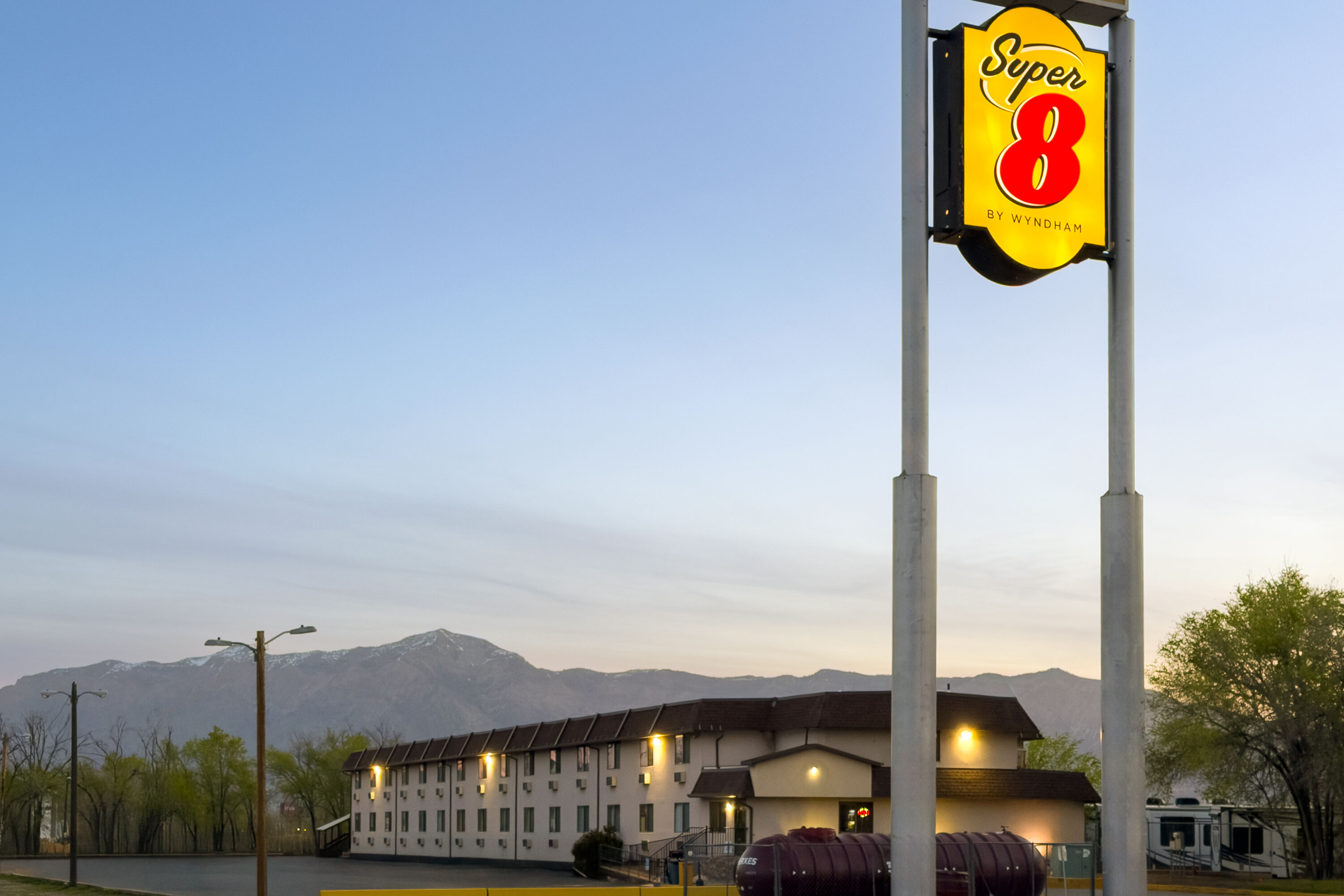 Exterior Dusk Image of Super 8 by Wyndham Ogden hotel in Ogden, Utah