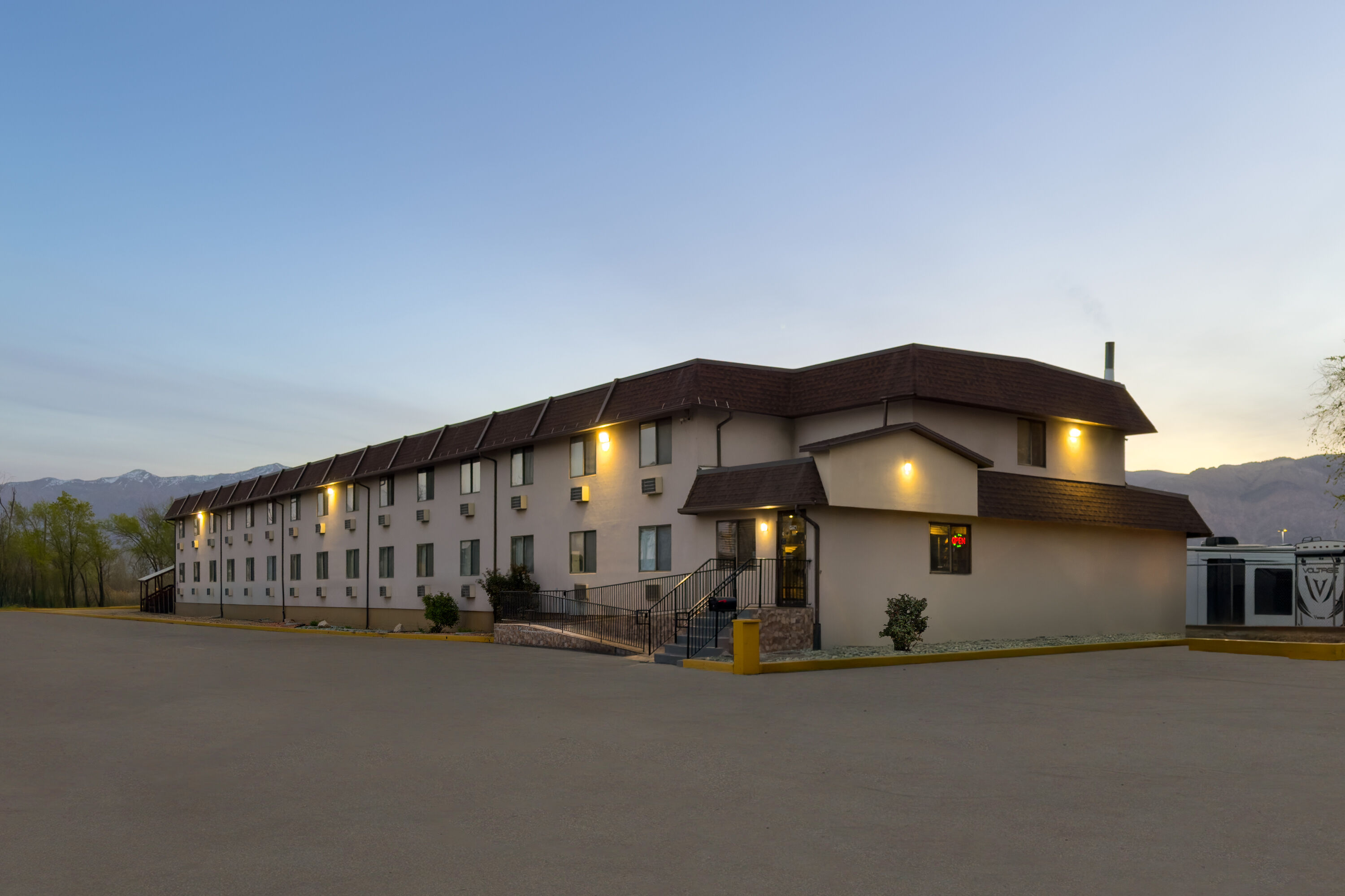 Exterior Dusk Image of Super 8 by Wyndham Ogden hotel in Ogden, Utah