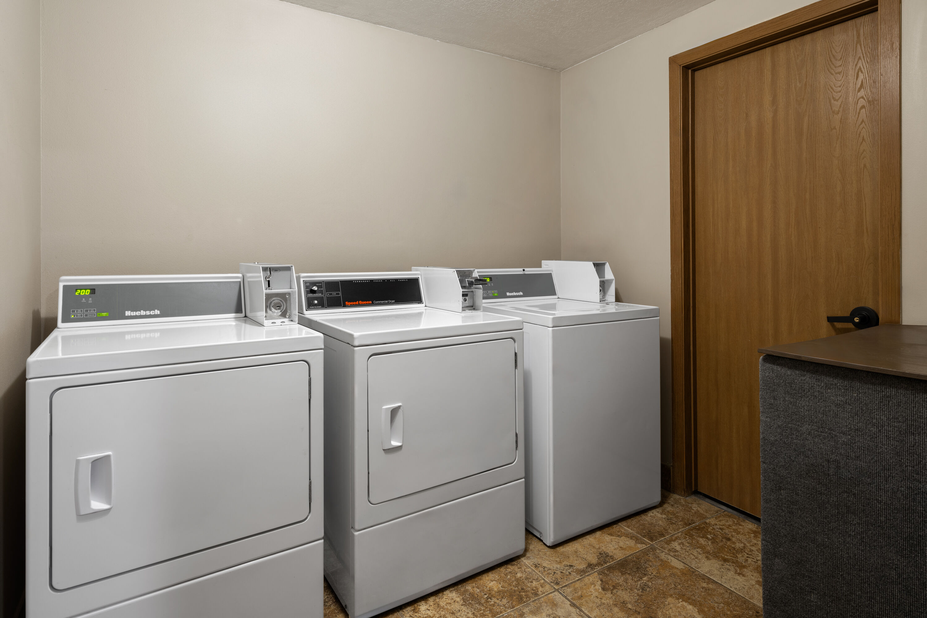 Laundry facilities at Super 8 by Wyndham Ogden in Ogden, Utah