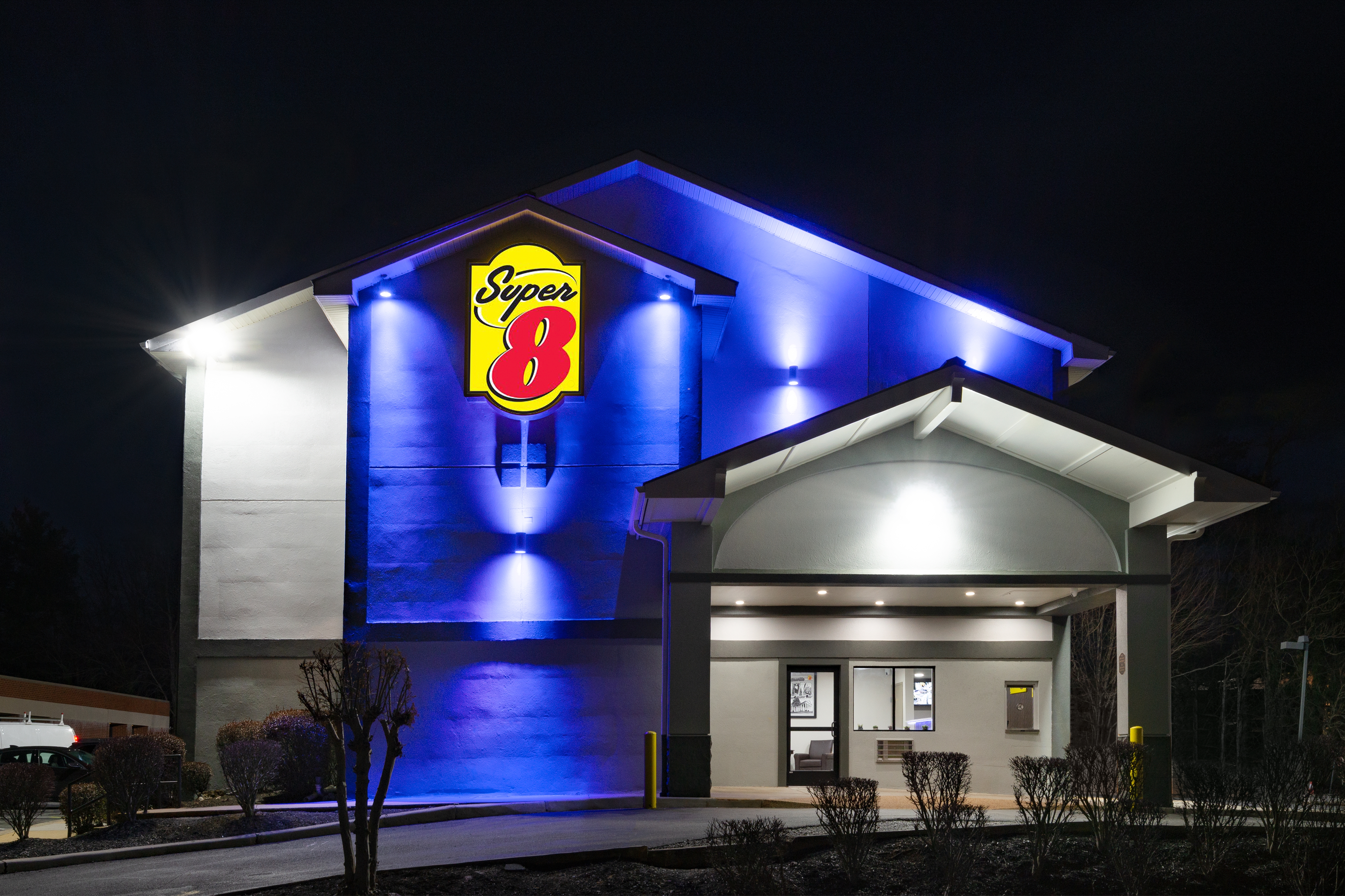 Exterior Night Image of Super 8 by Wyndham Charlottesville hotel in Charlottesville, Virginia