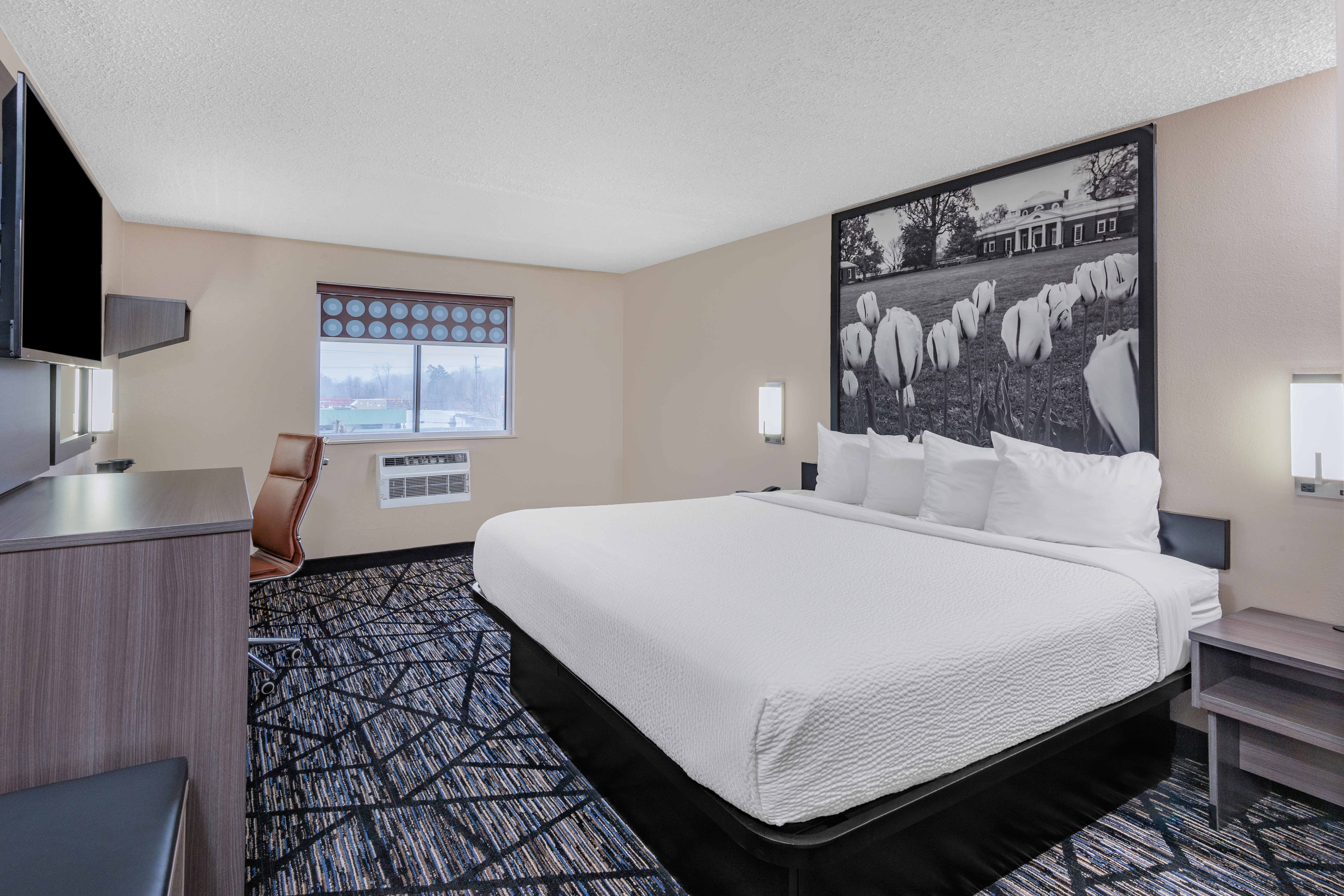 Guest room at the Super 8 by Wyndham Charlottesville in Charlottesville, Virginia