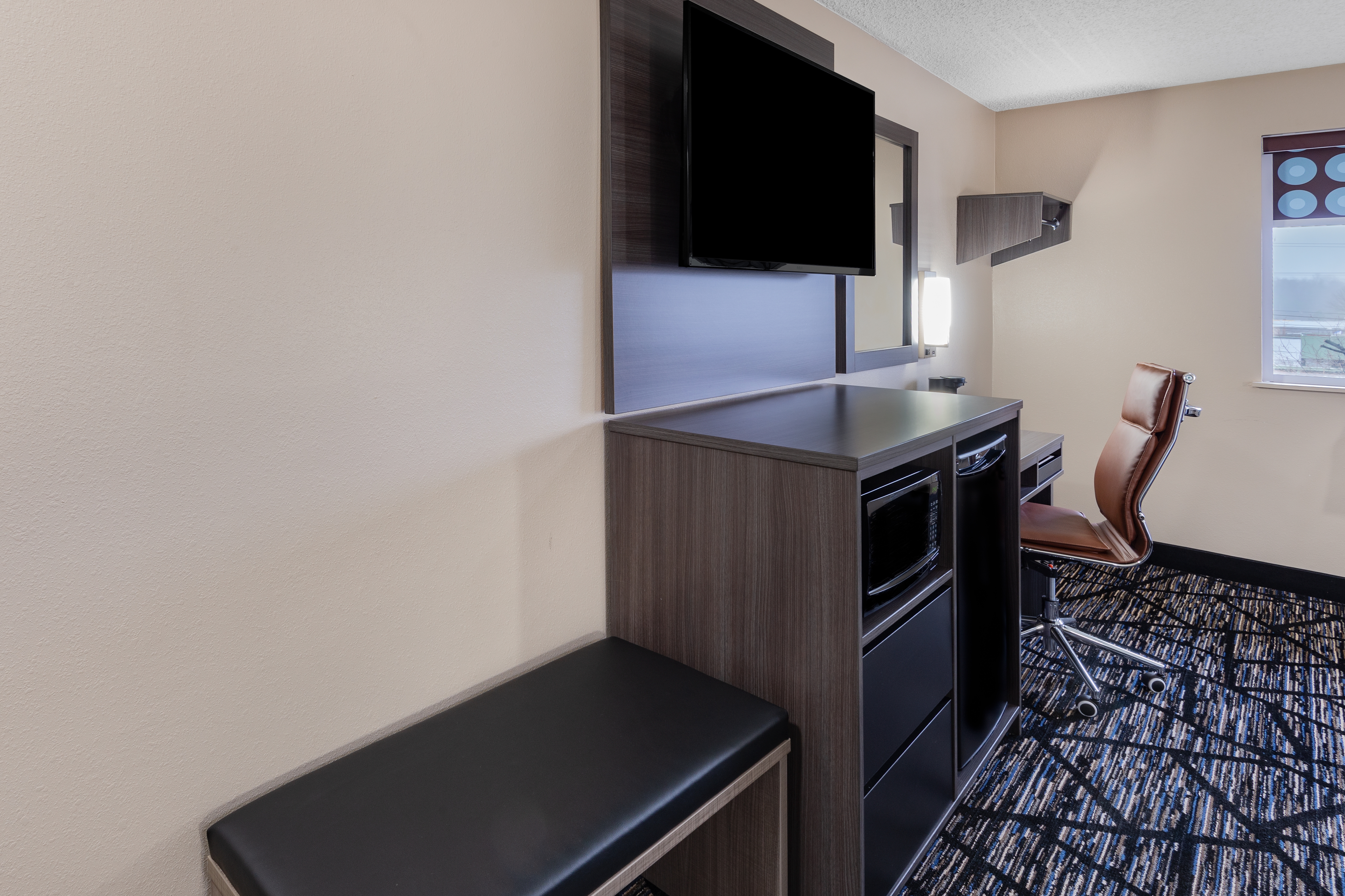 Guest room at the Super 8 by Wyndham Charlottesville in Charlottesville, Virginia