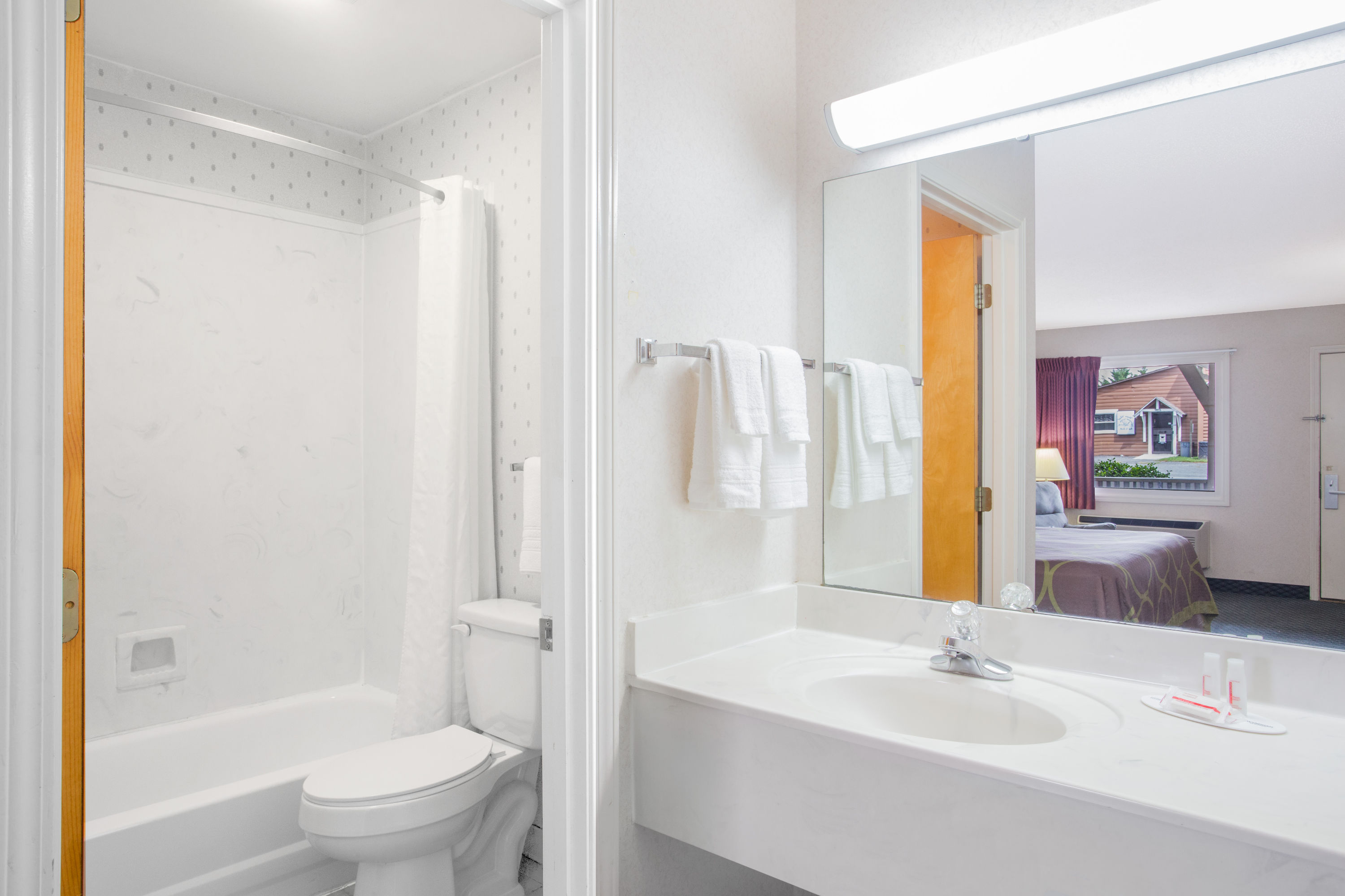 Guest room bath at the Super 8 by Wyndham Christiansburg in Christiansburg, Virginia