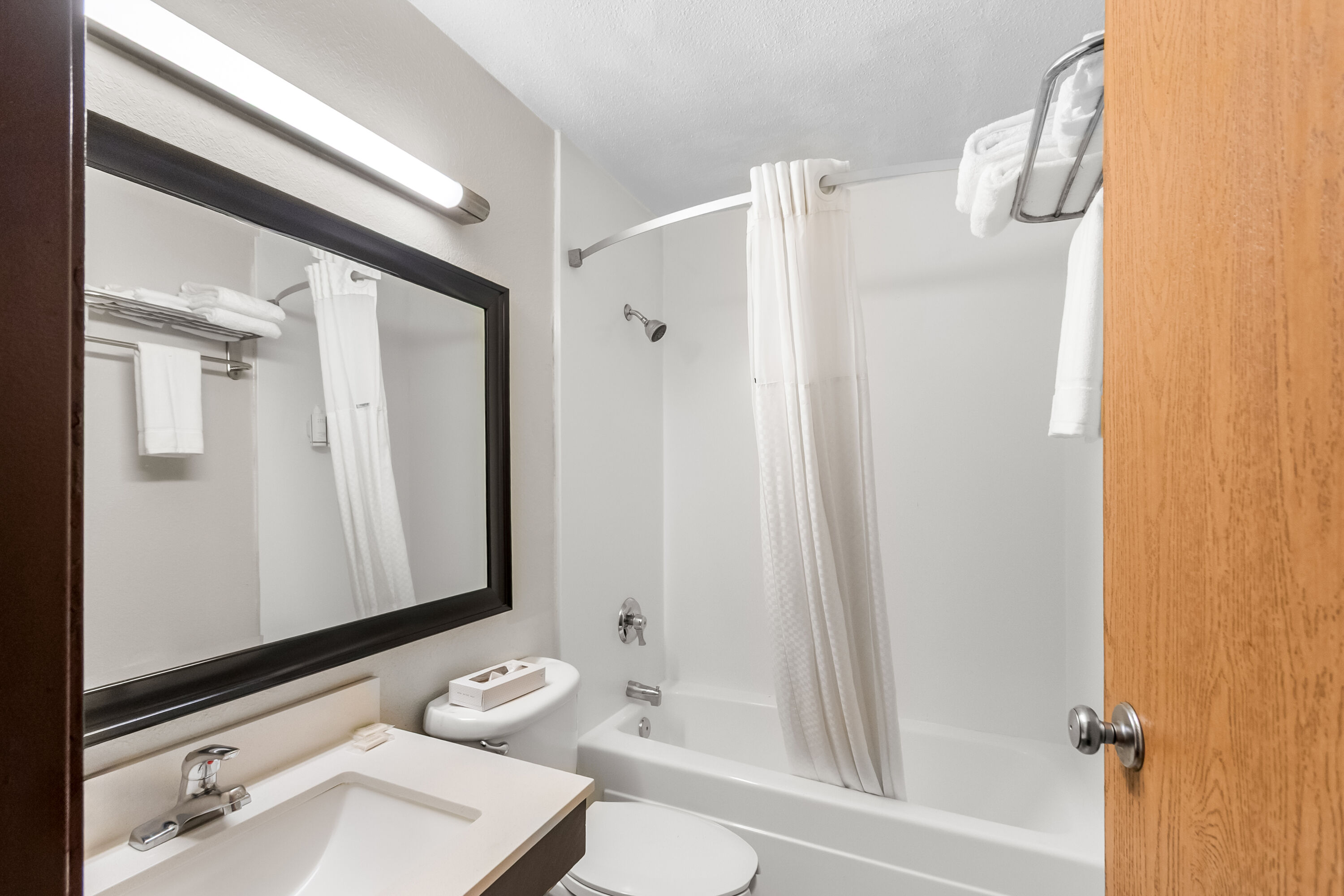 Guest room bath at the Super 8 by Wyndham Dumfries/Quantico in Dumfries, Virginia