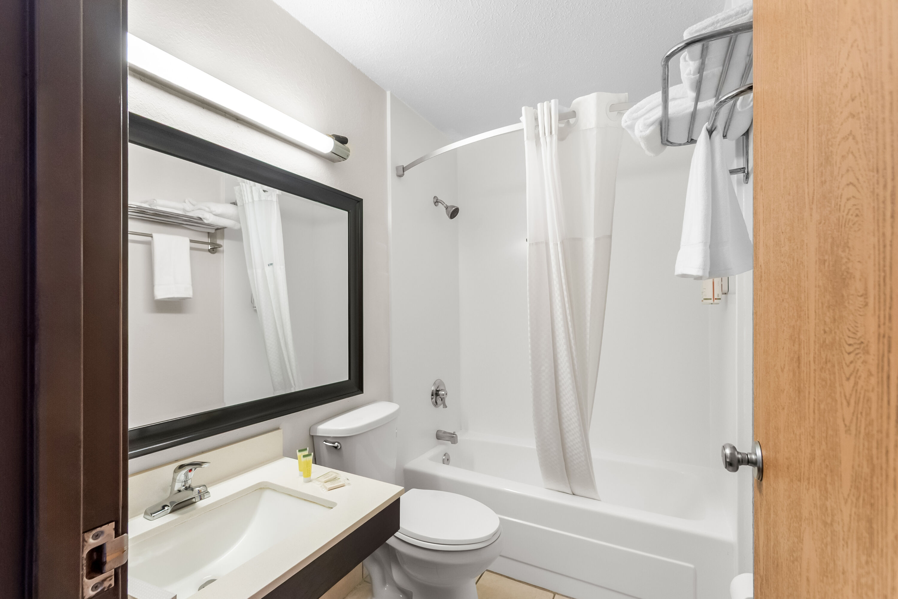 Guest room bath at the Super 8 by Wyndham Dumfries/Quantico in Dumfries, Virginia