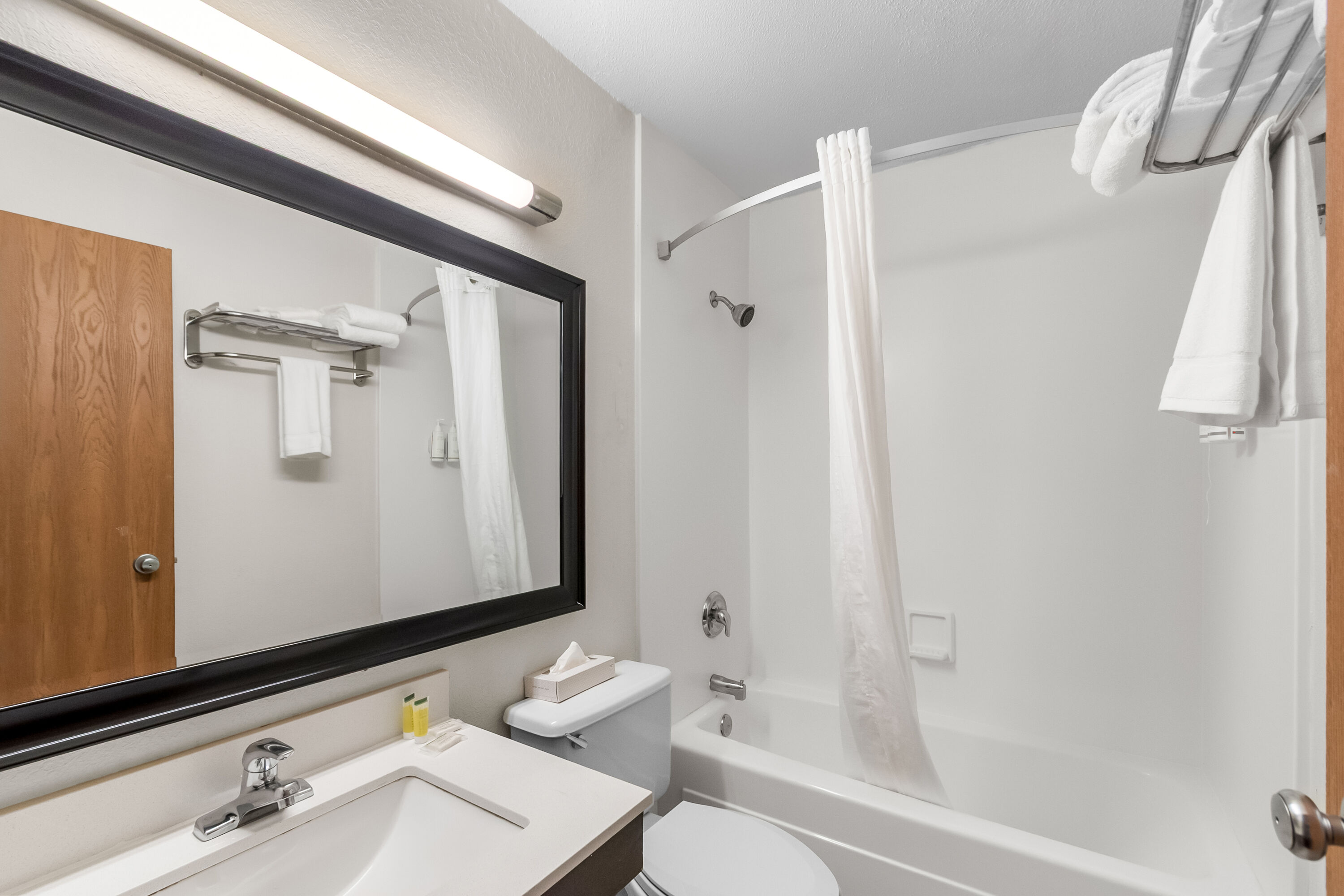 Guest room bath at the Super 8 by Wyndham Dumfries/Quantico in Dumfries, Virginia