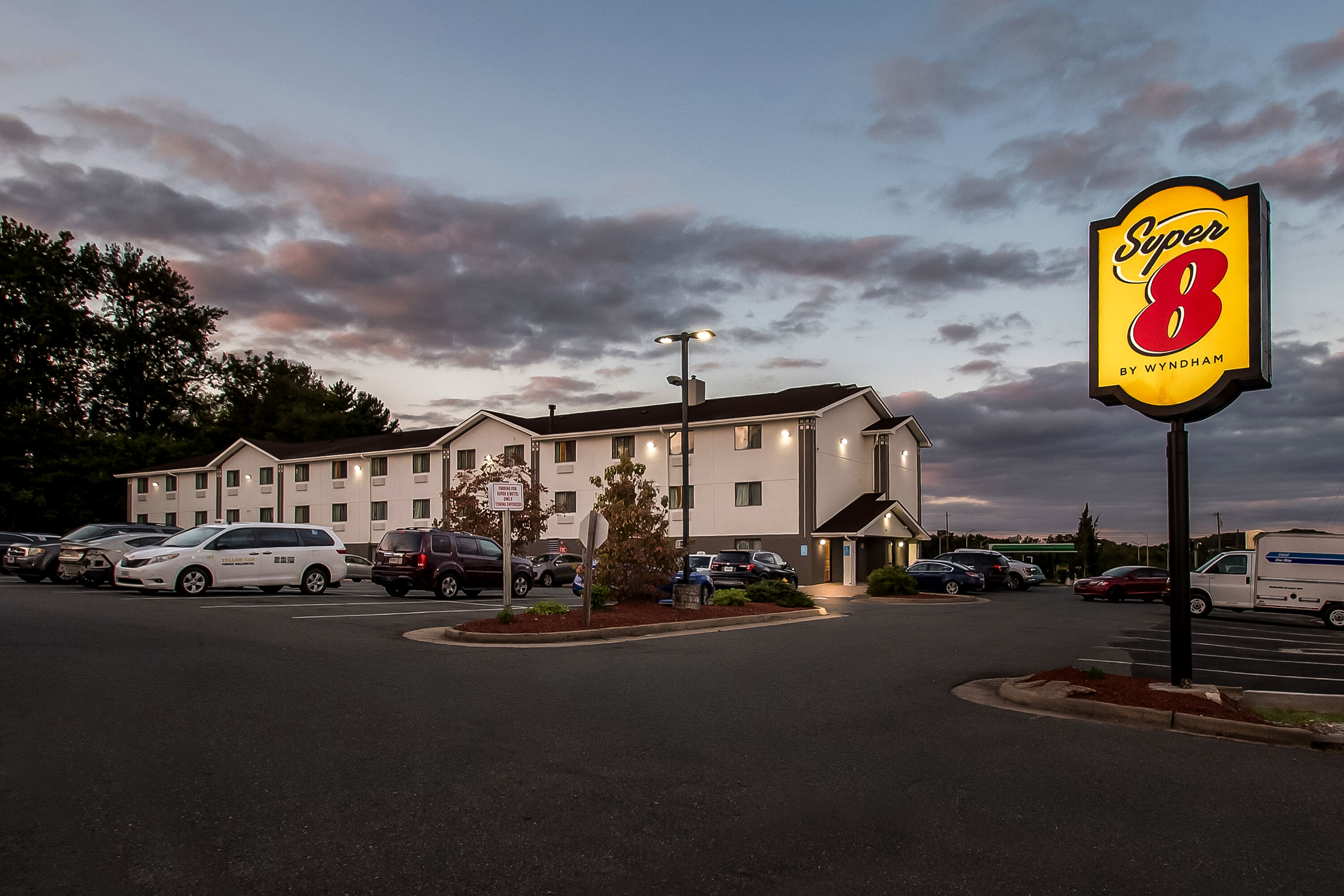 Exterior Night Image of Super 8 by Wyndham Dumfries/Quantico hotel in Dumfries, Virginia