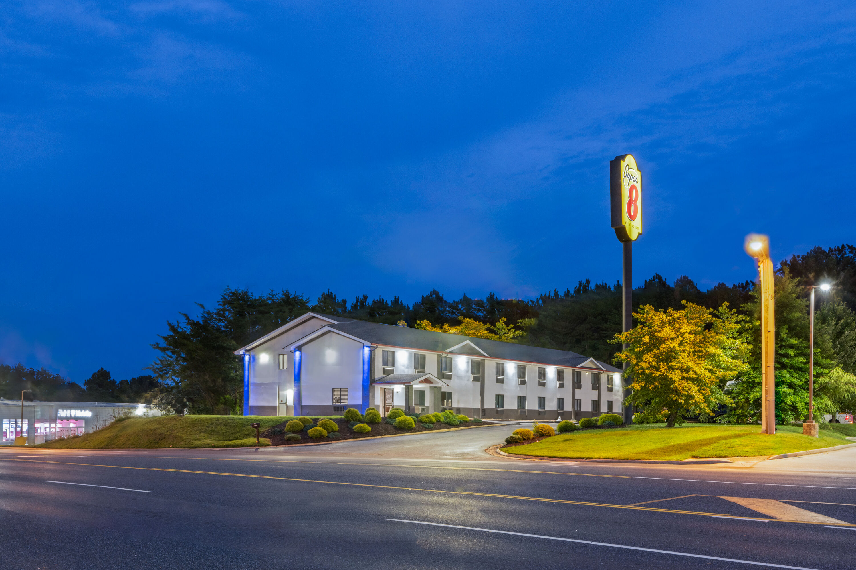 Exterior Dusk Image of Super 8 by Wyndham Farmville hotel in Farmville, Virginia