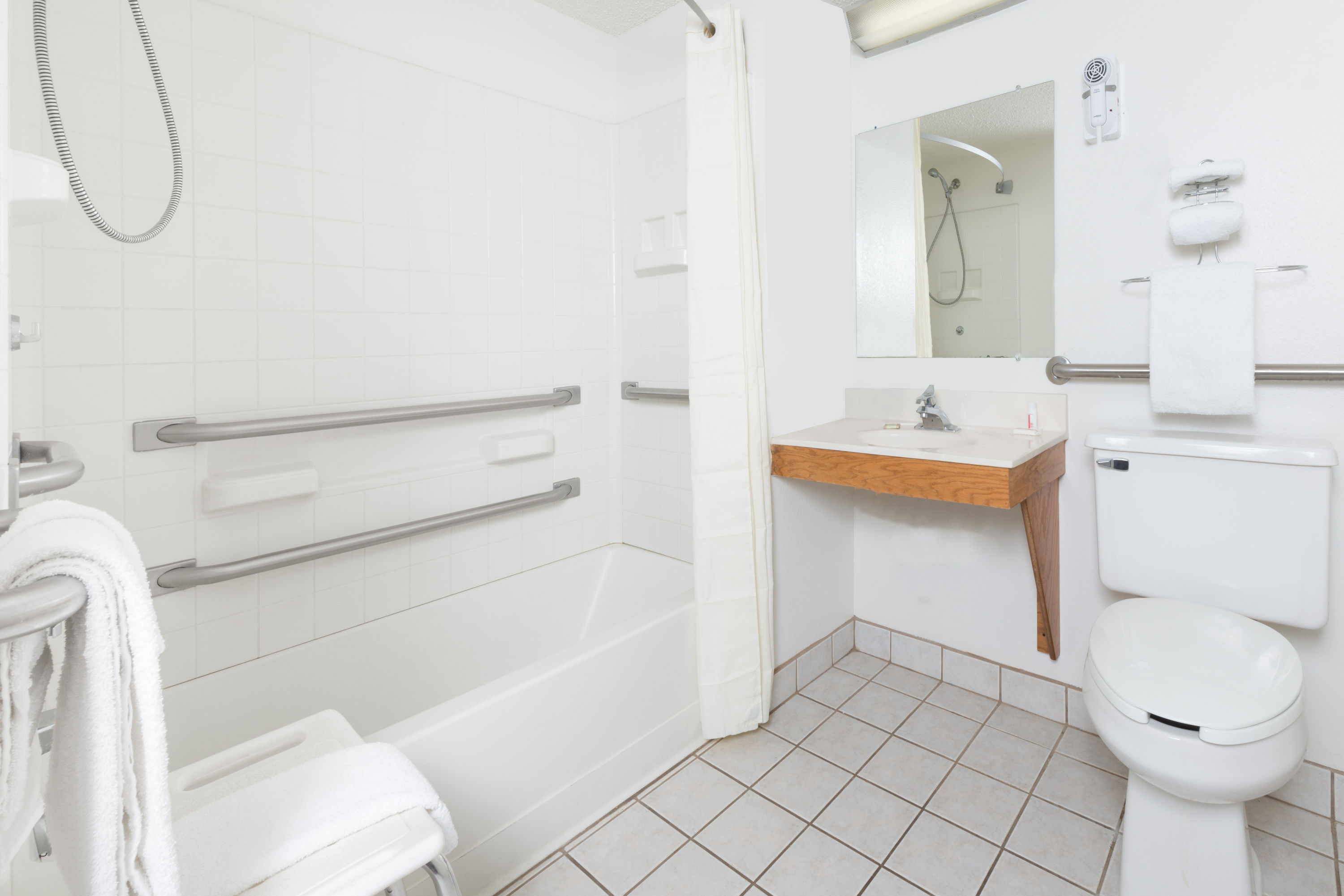 Guest room at the Super 8 by Wyndham Front Royal in Front Royal, Virginia