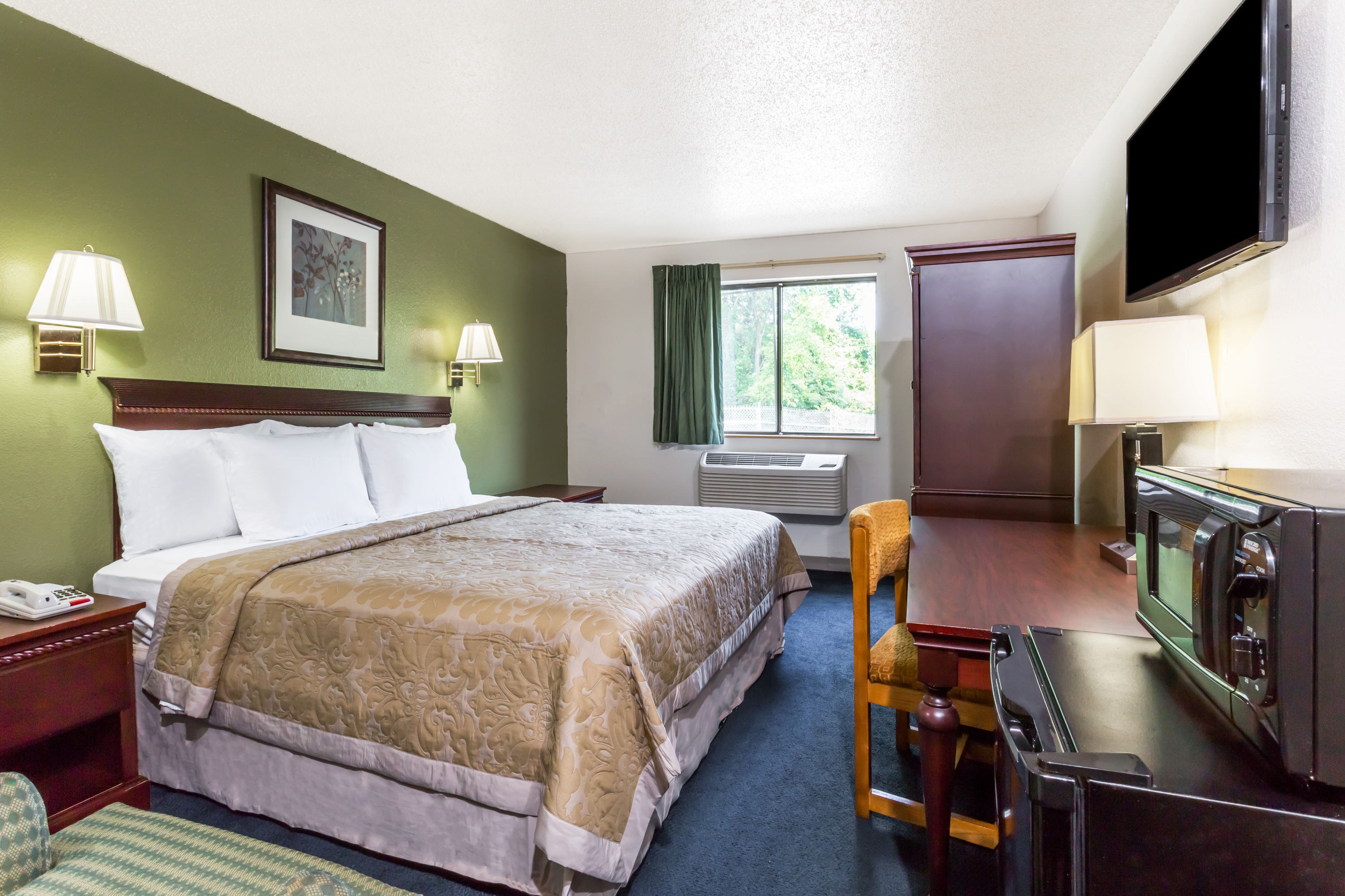 Guest room at the Super 8 by Wyndham Hampton in Hampton, Virginia