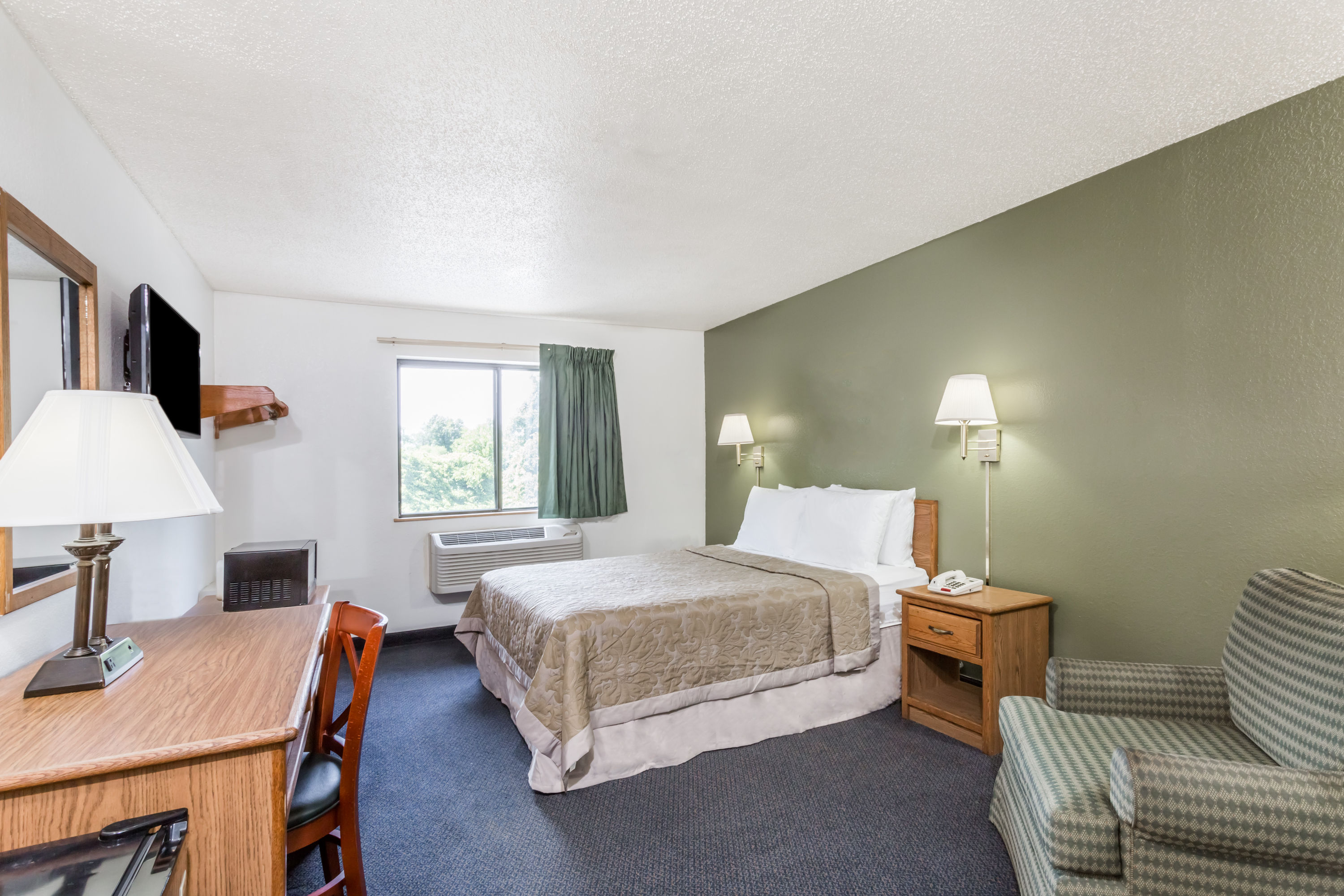 Guest room at the Super 8 by Wyndham Hampton in Hampton, Virginia