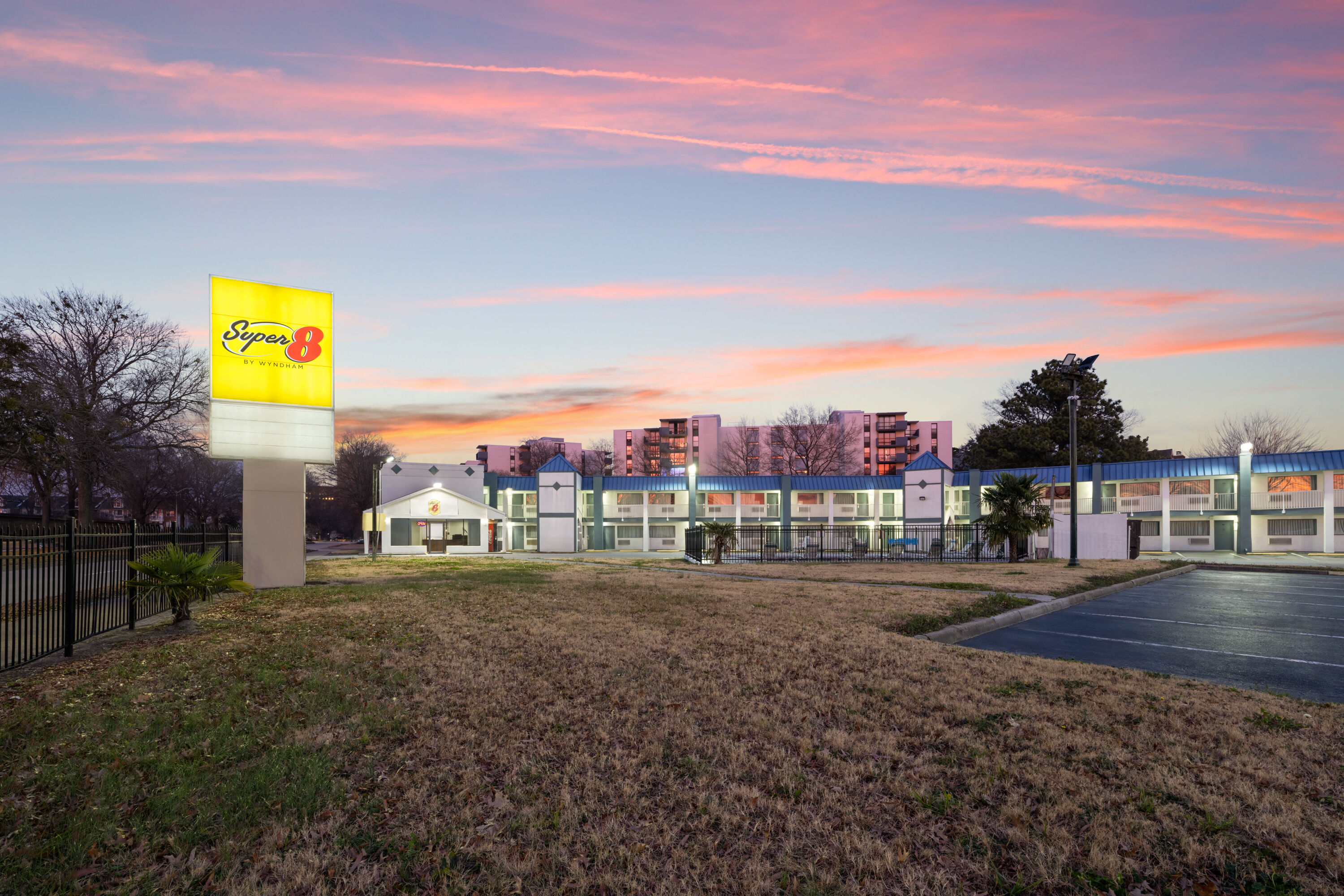 Exterior Dusk Image of Super 8 by Wyndham Portsmouth - Norfolk hotel in Portsmouth, Virginia