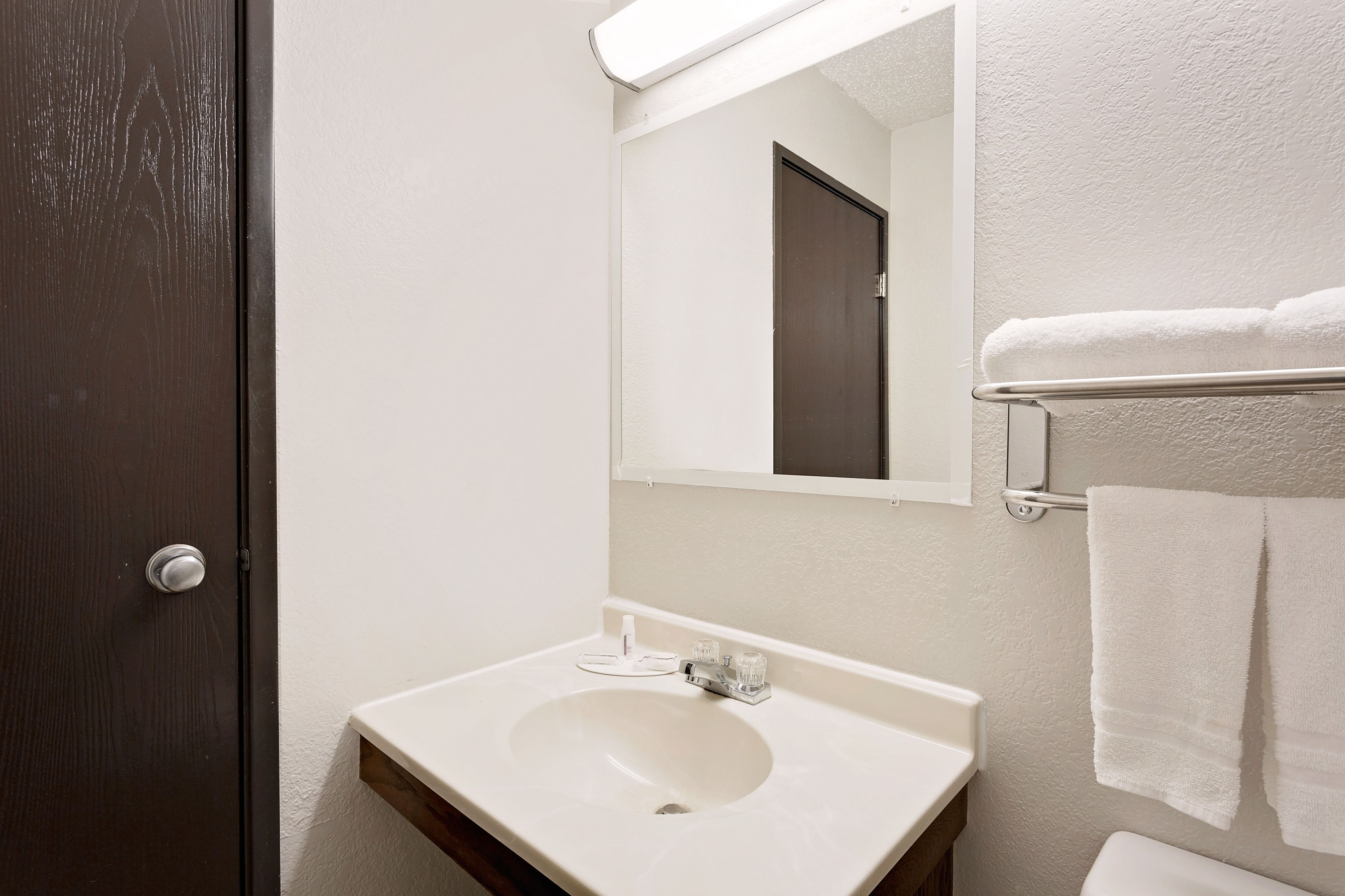 Guest room bath at the Super 8 by Wyndham Waynesboro in Waynesboro, Virginia