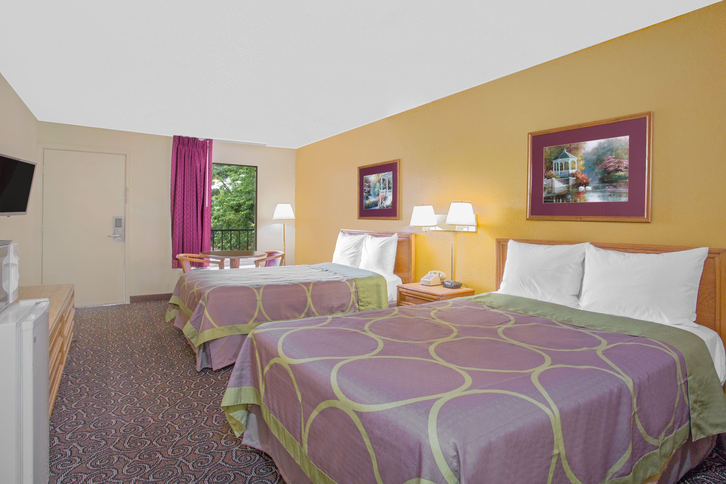 Guest room at the Super 8 by Wyndham Williamsburg Pottery in Williamsburg, Virginia