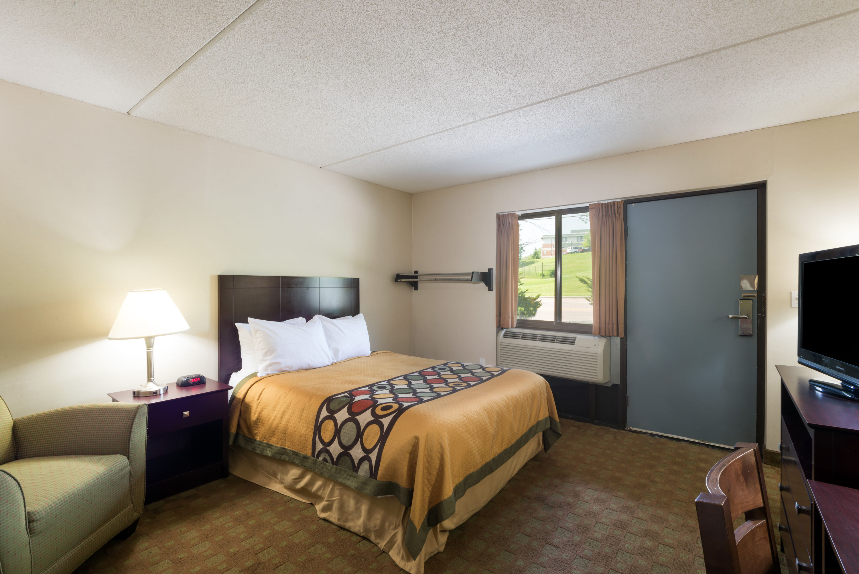 Guest room at the Super 8 by Wyndham White River Junction in White River Junction, Vermont