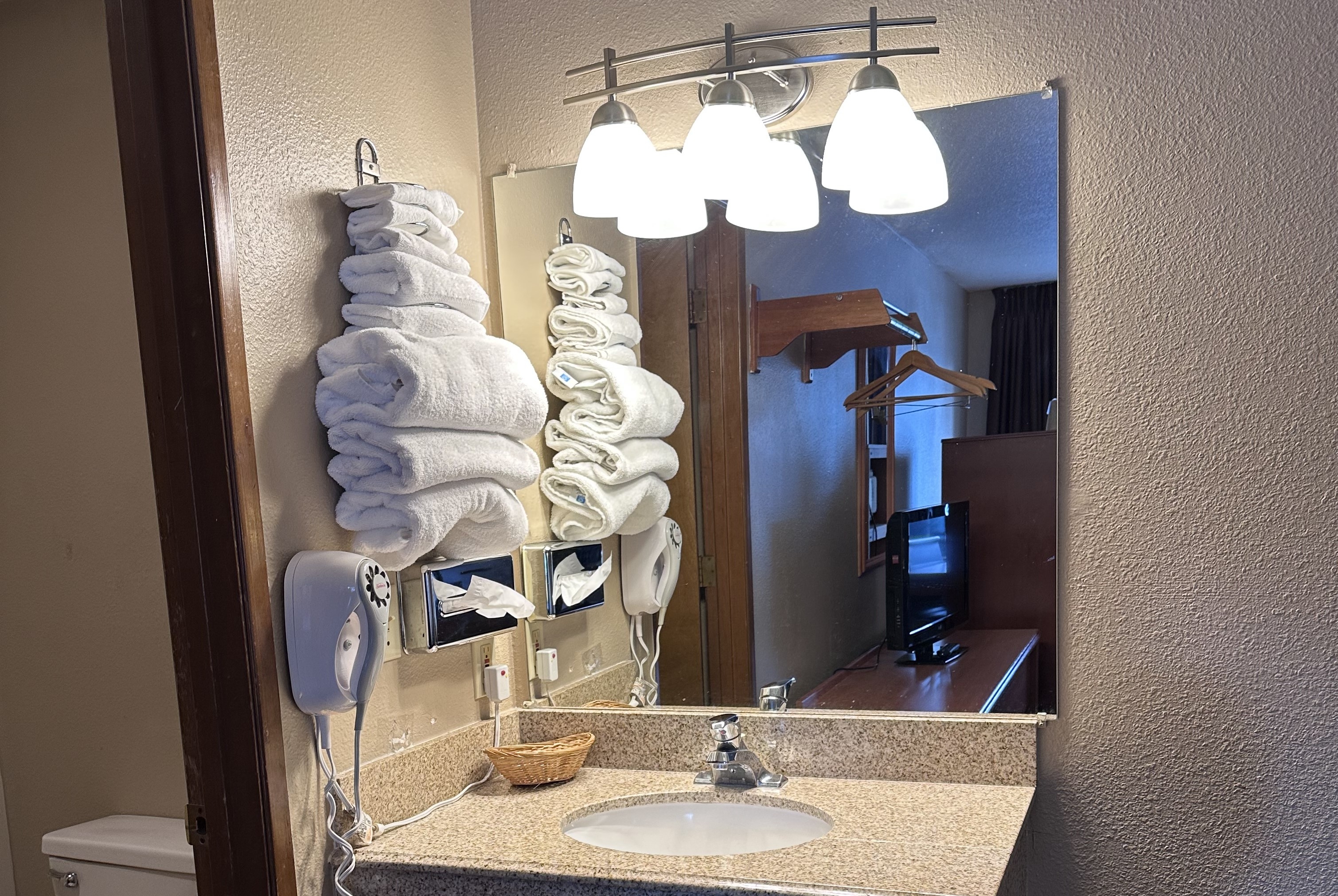 Guest room bath at the Super 8 by Wyndham Vancouver East in Vancouver, Washington