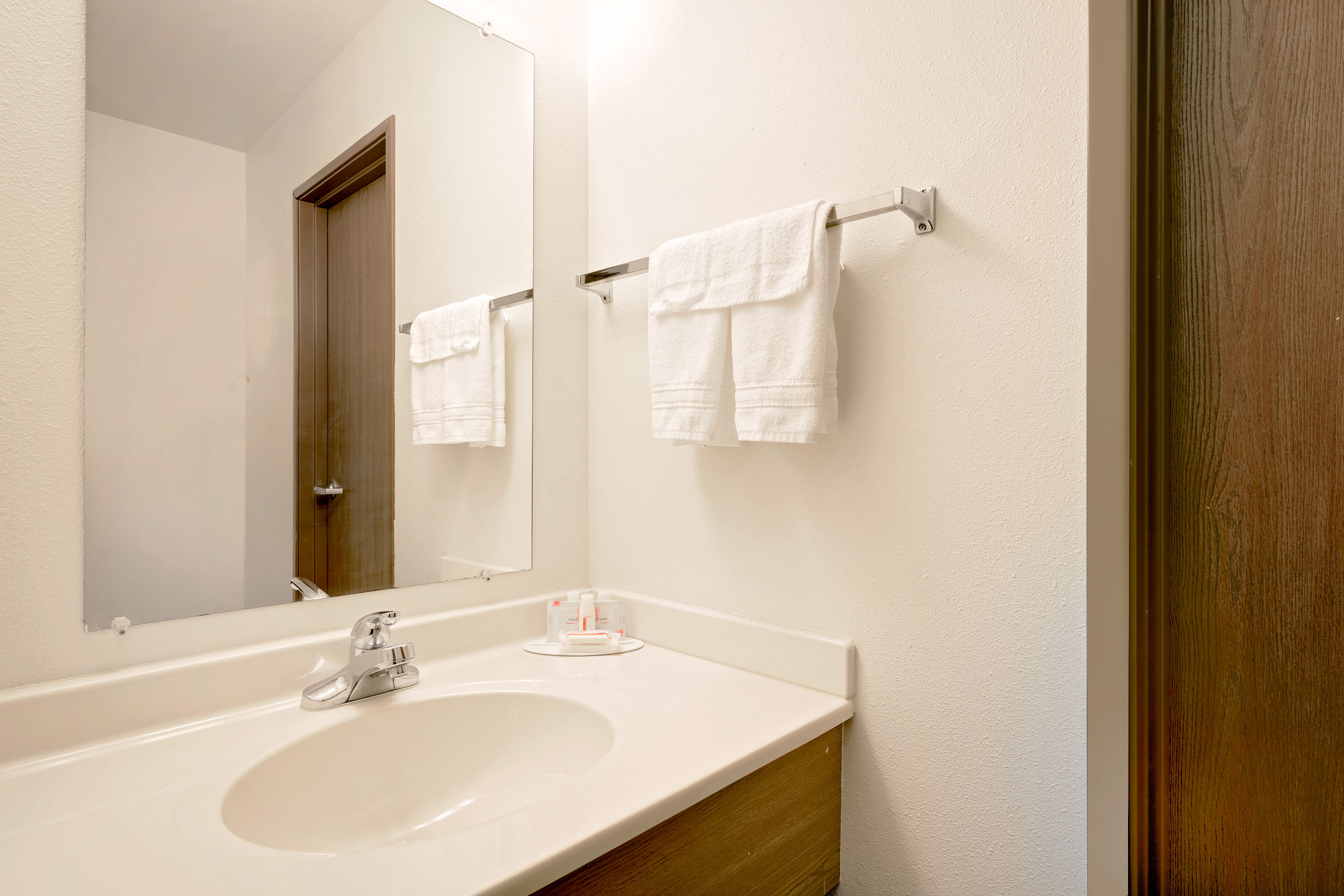 Guest room bath at the Super 8 by Wyndham Ashland in Ashland, Wisconsin