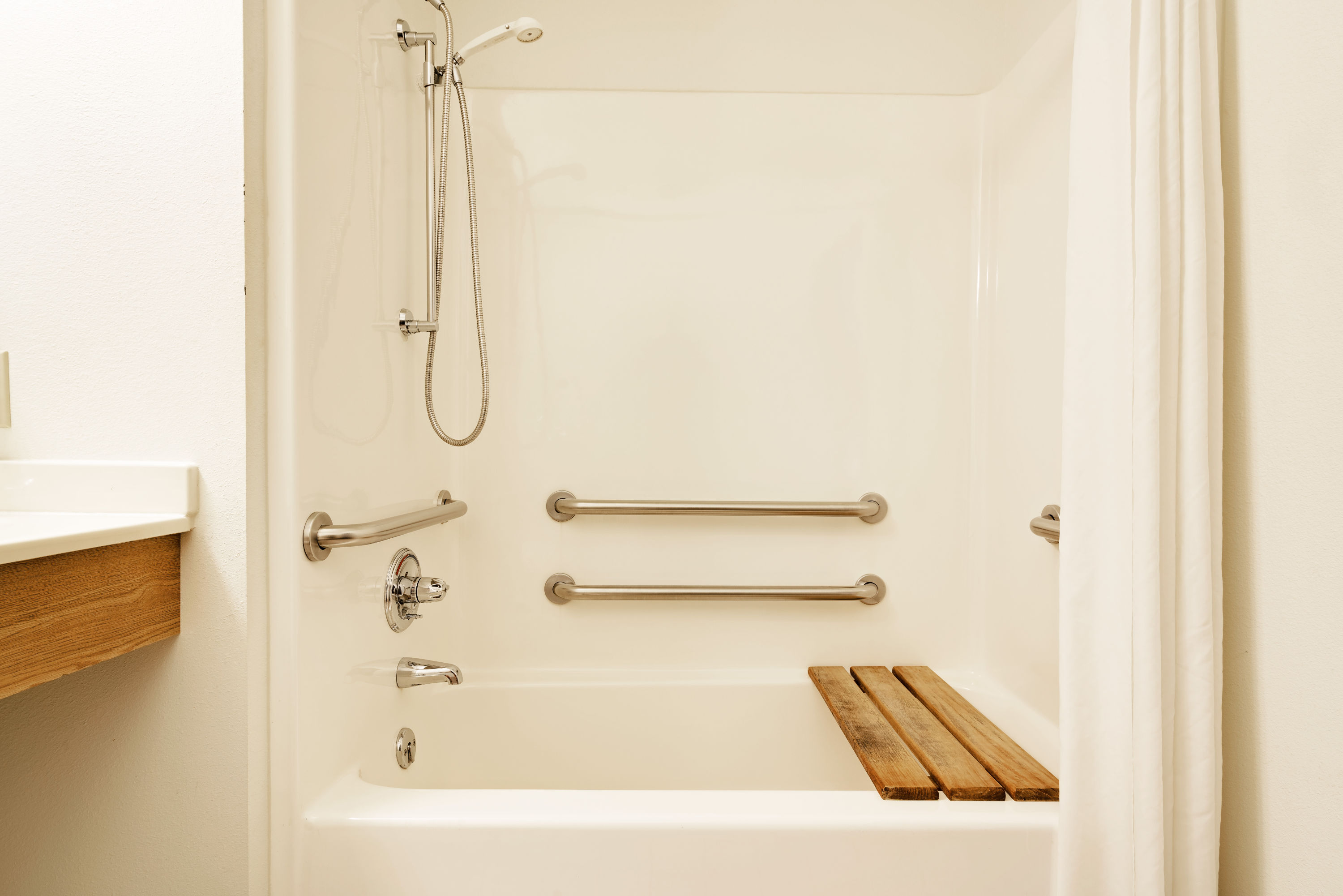 Guest room bath at the Super 8 by Wyndham Ashland in Ashland, Wisconsin