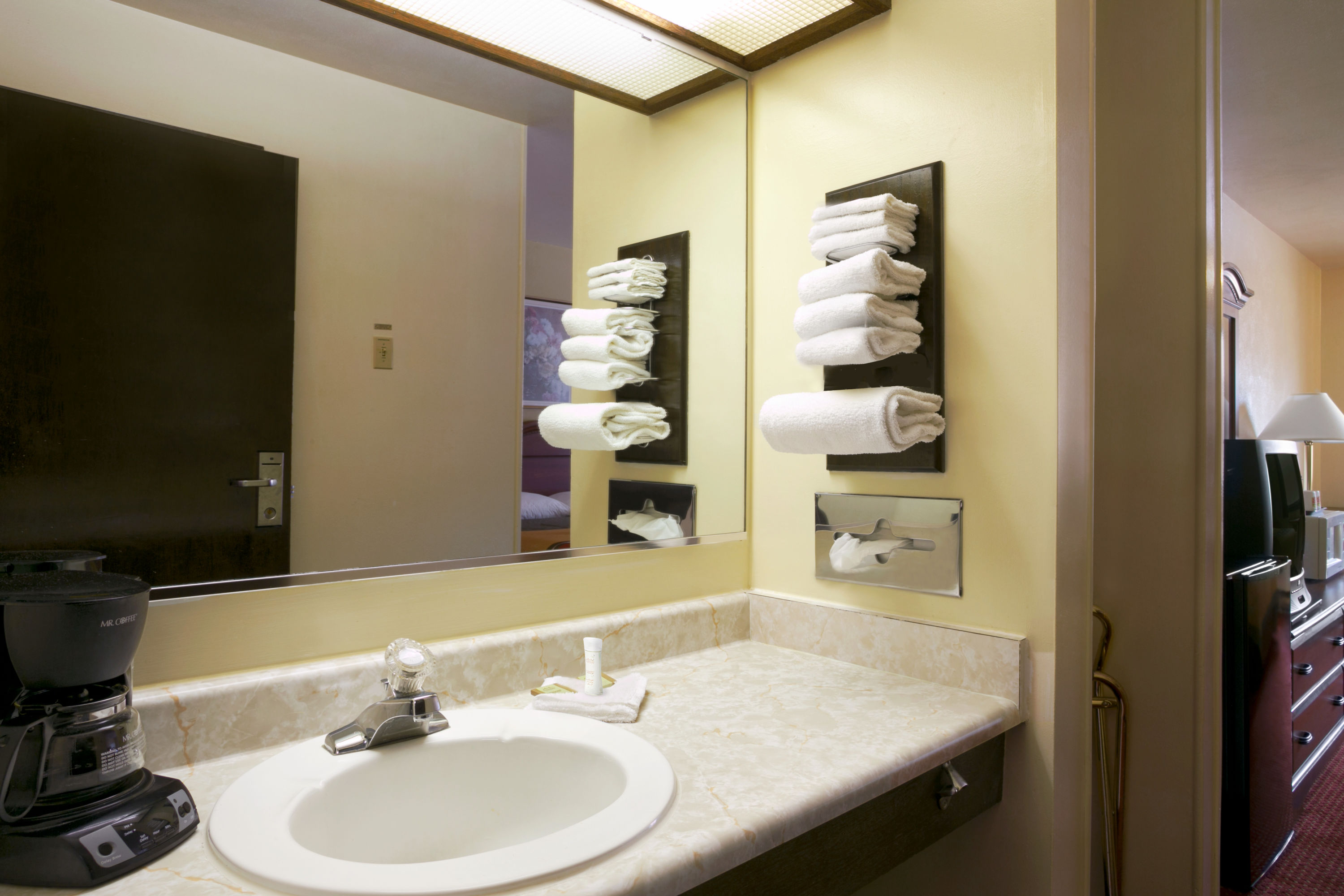 Guest room bath at the Super 8 by Wyndham Eau Claire WI in Eau Claire, Wisconsin