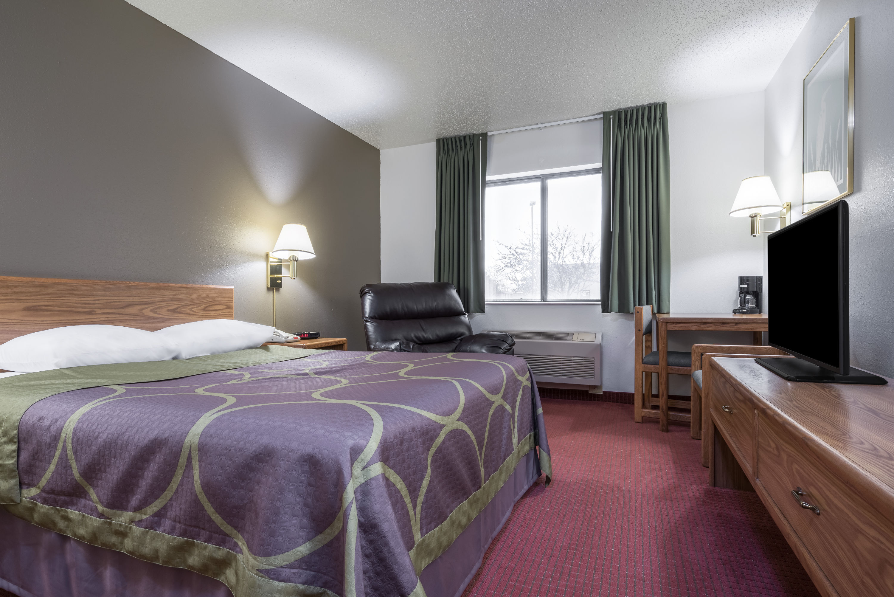 Guest room at the Super 8 by Wyndham Fond Du Lac in Fond du Lac, Wisconsin