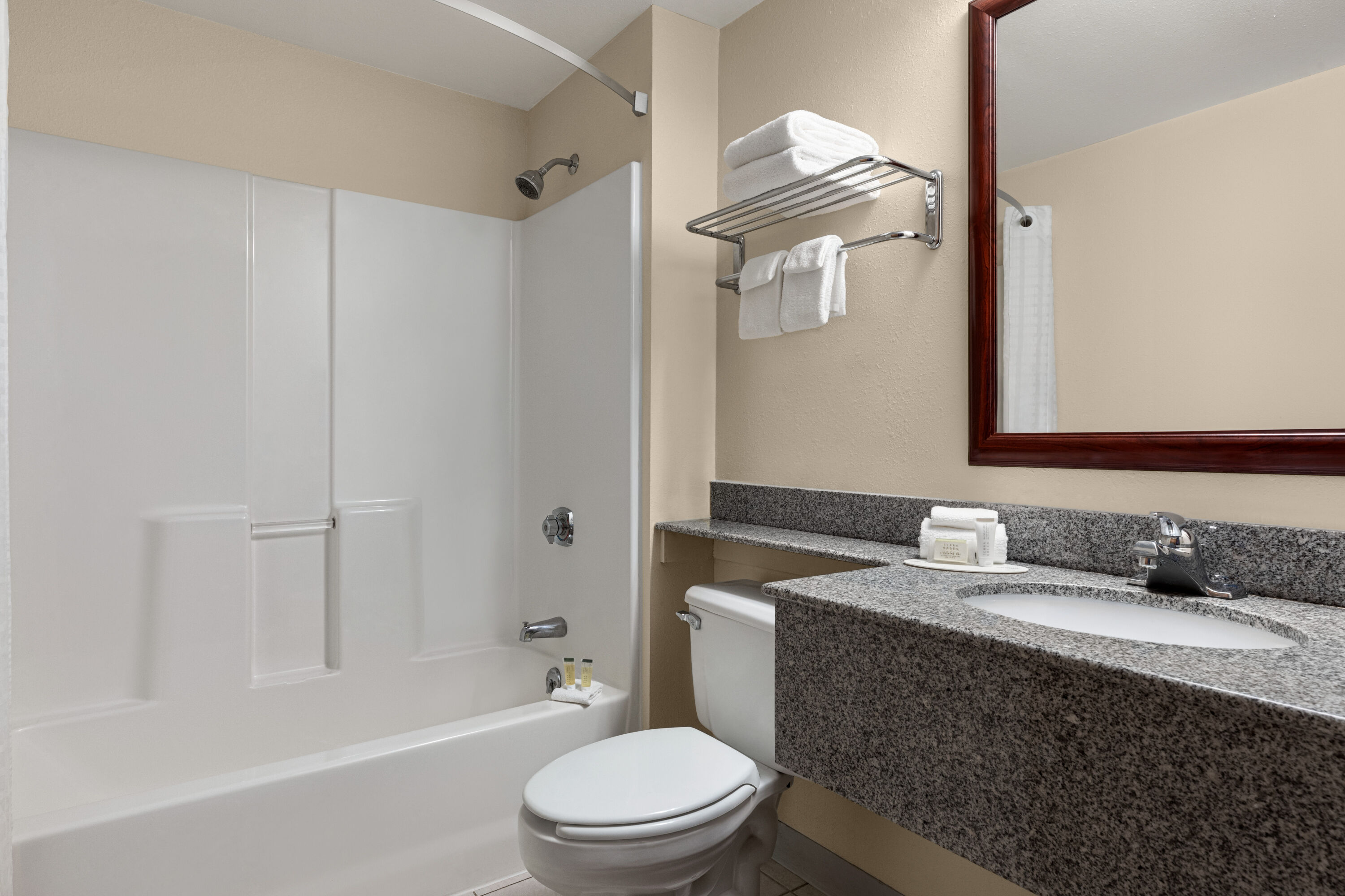 Guest room bath at the Super 8 by Wyndham Germantown/Milwaukee in Germantown, Wisconsin