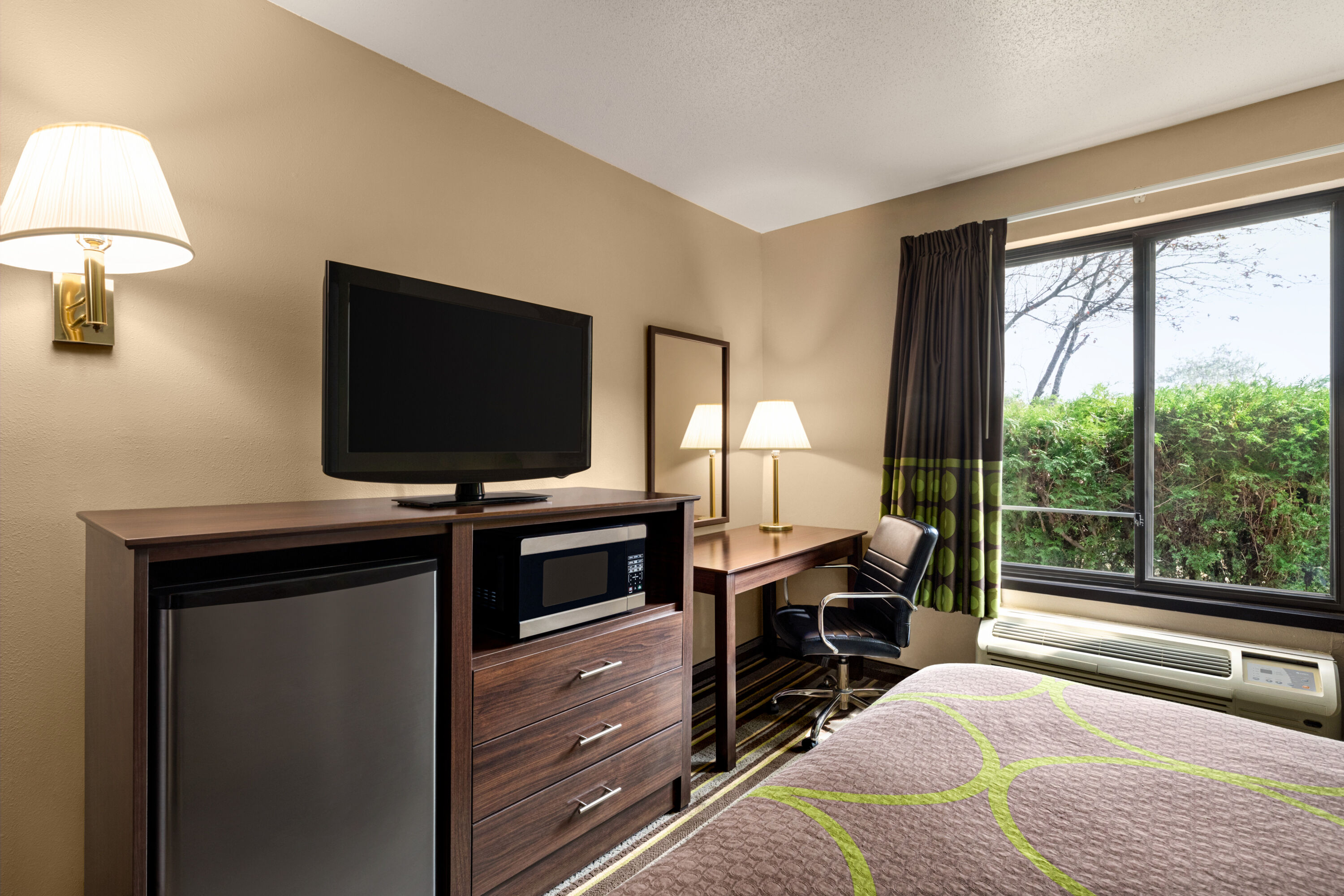 Guest room at the Super 8 by Wyndham Germantown/Milwaukee in Germantown, Wisconsin