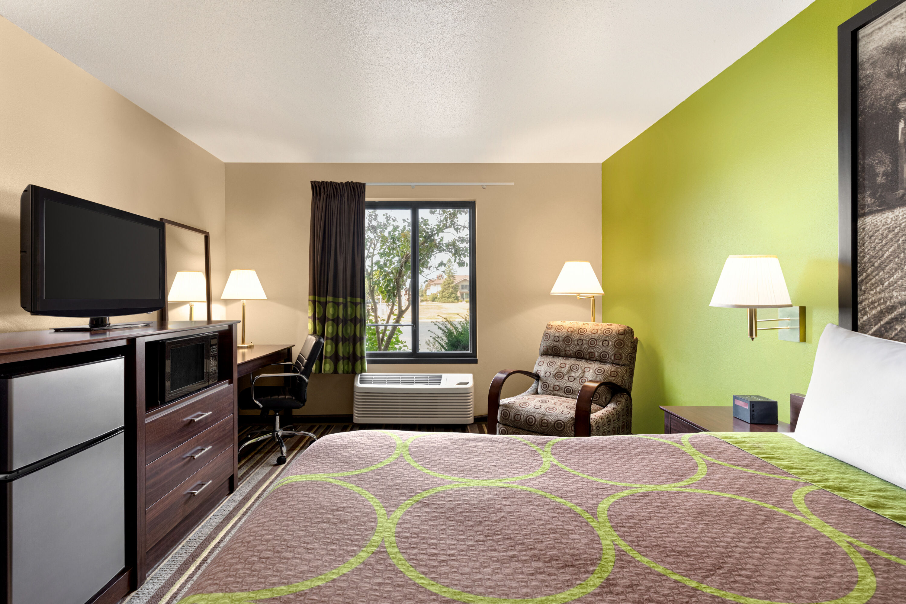 Guest room at the Super 8 by Wyndham Germantown/Milwaukee in Germantown, Wisconsin