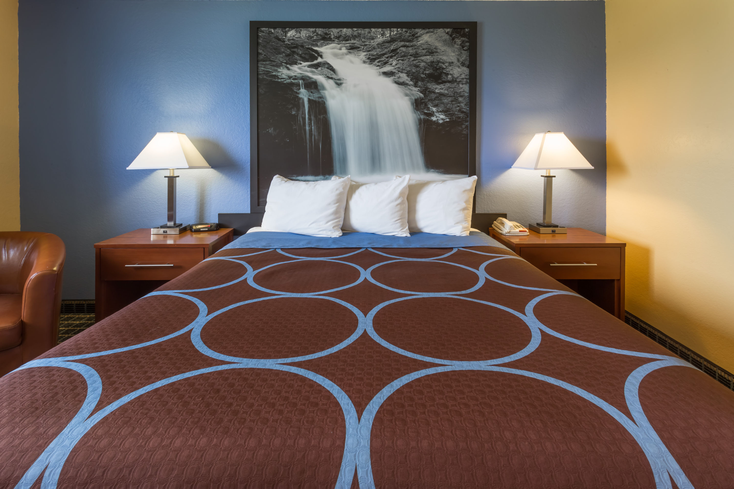 Guest room at the Super 8 by Wyndham Janesville in Janesville, Wisconsin