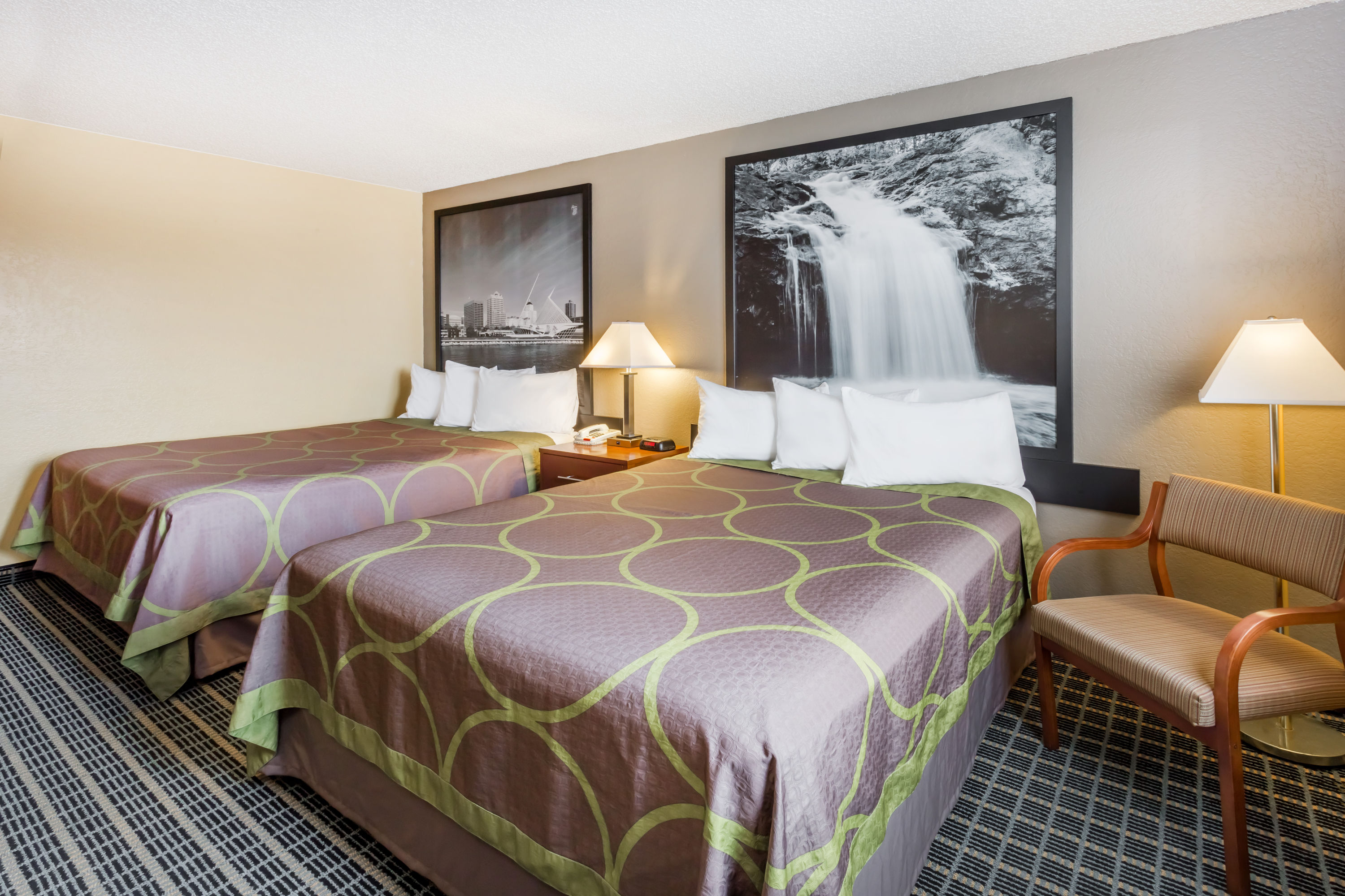 Guest room at the Super 8 by Wyndham Janesville in Janesville, Wisconsin