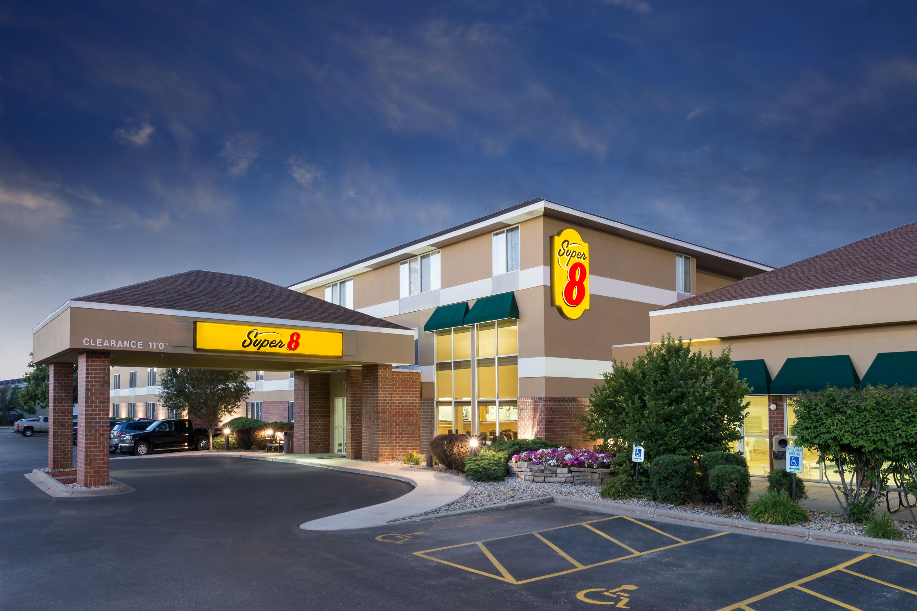 Exterior Dusk Image of Super 8 by Wyndham Madison South hotel in Madison, Wisconsin