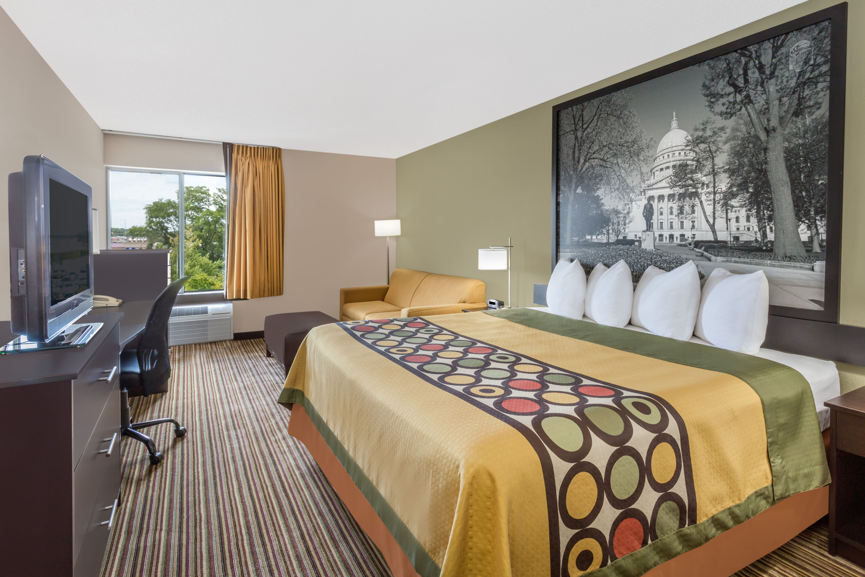 Guest room at the Super 8 by Wyndham Madison South in Madison, Wisconsin