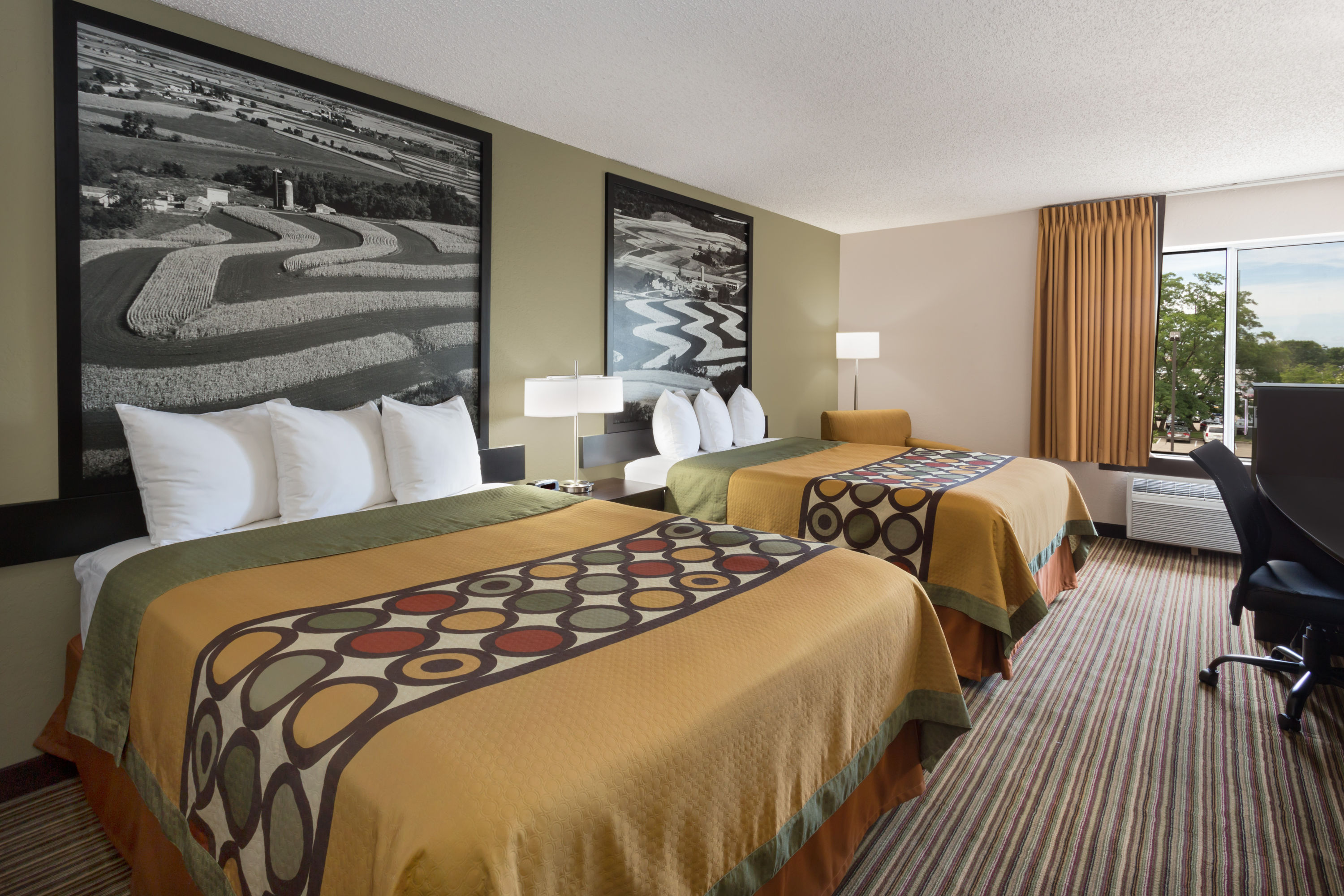 Guest room at the Super 8 by Wyndham Madison South in Madison, Wisconsin