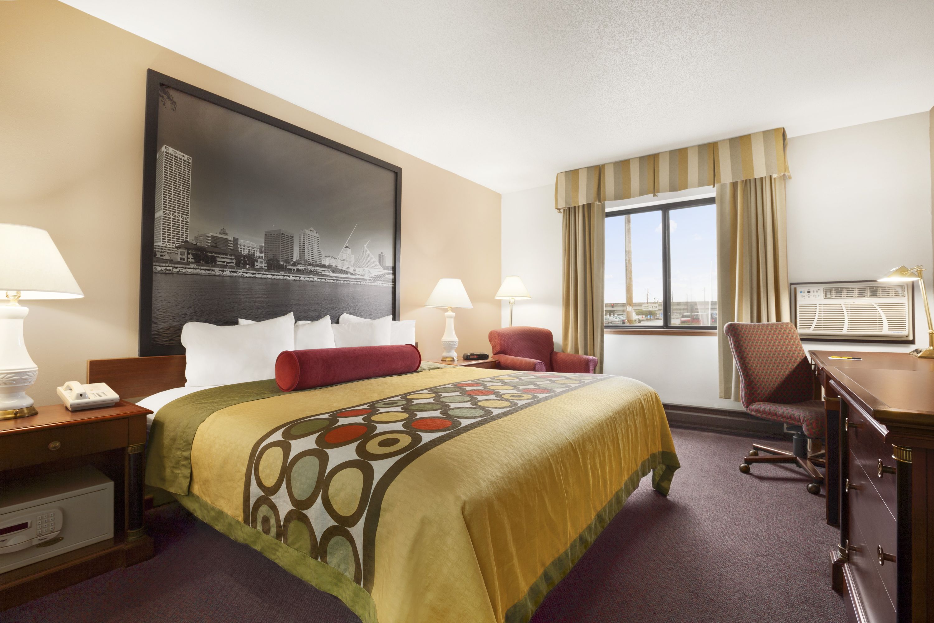 Guest room at the Super 8 by Wyndham Milwaukee Airport in Milwaukee, Wisconsin
