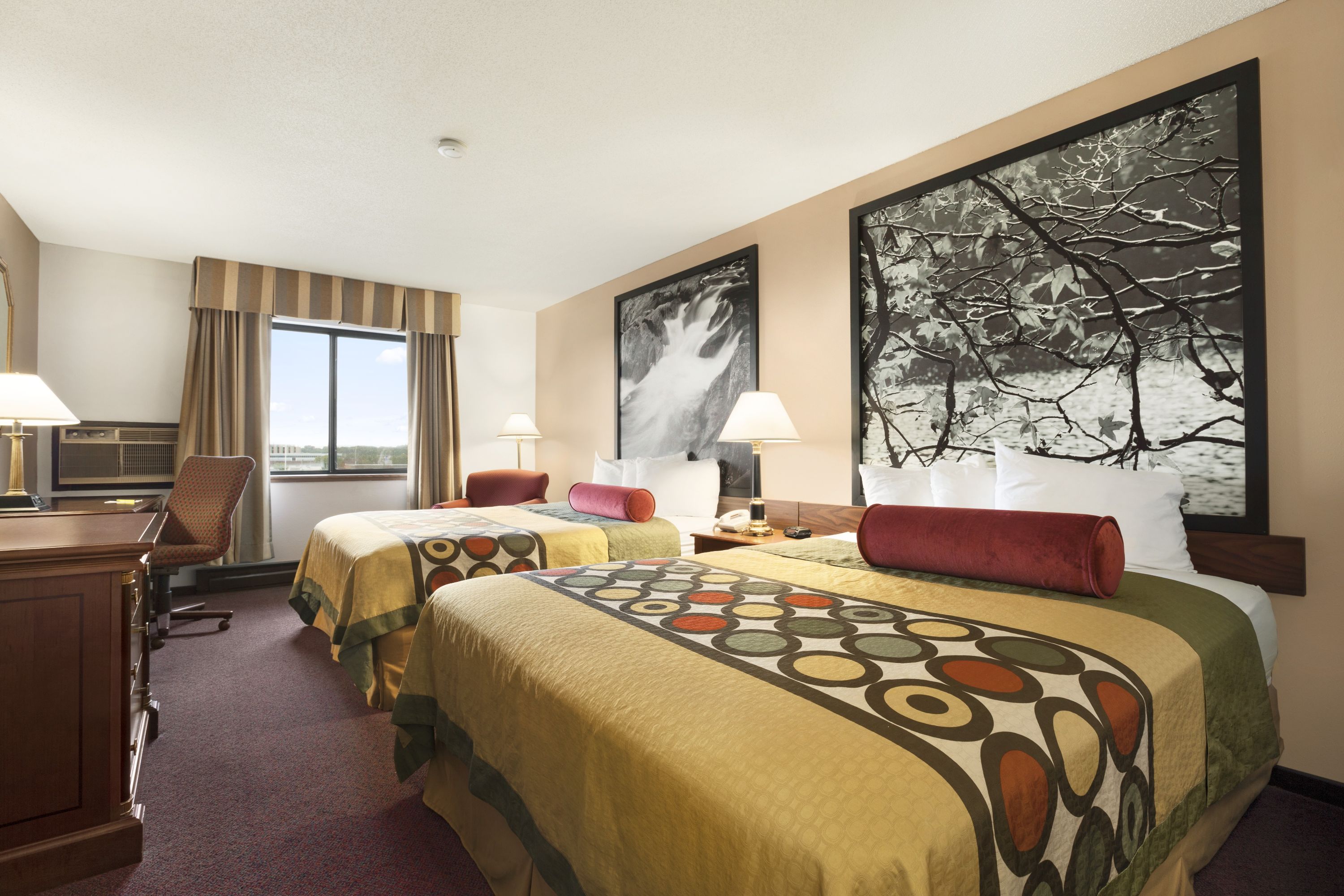 Guest room at the Super 8 by Wyndham Milwaukee Airport in Milwaukee, Wisconsin