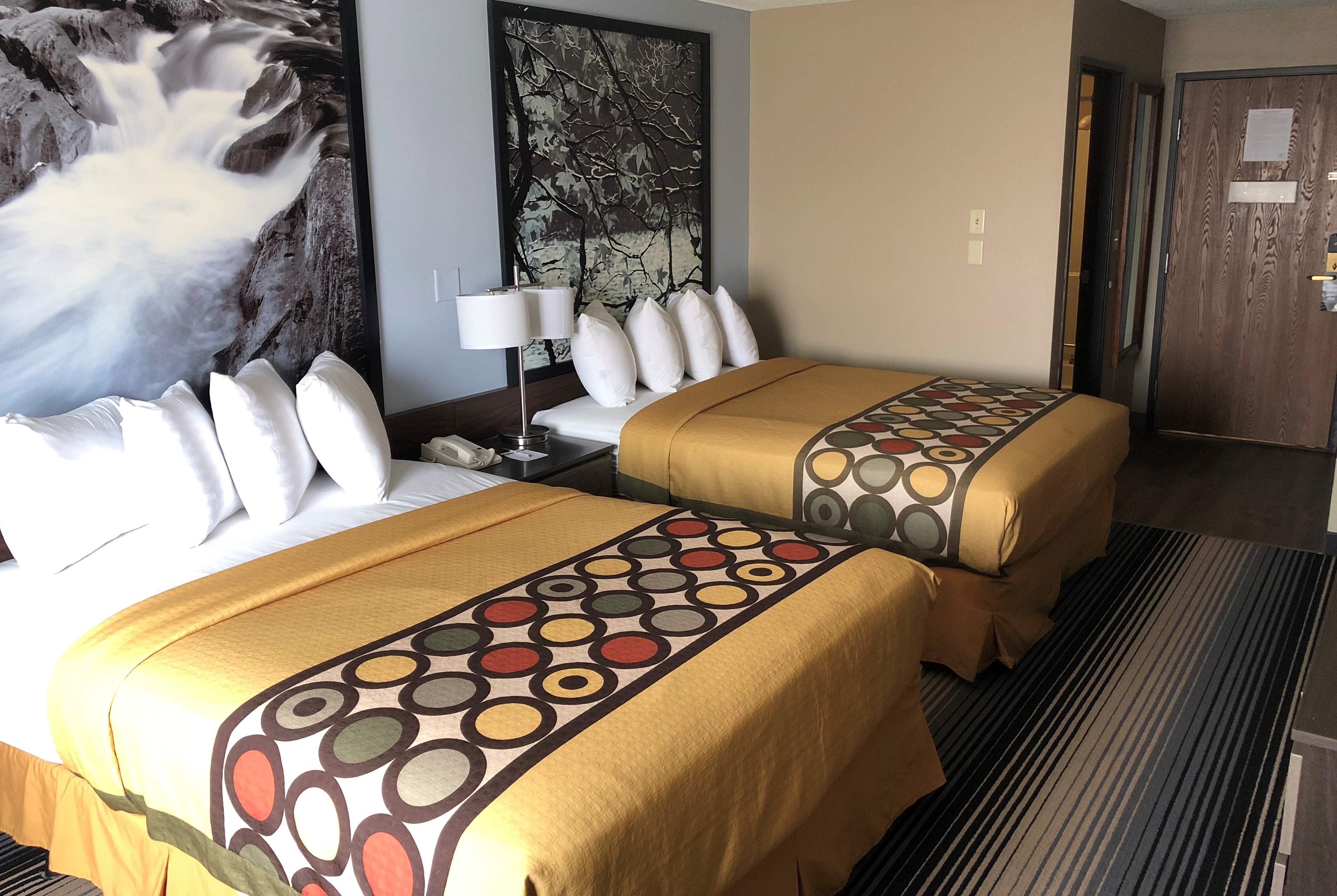 Double bed guest room at the Super 8 by Wyndham Milwaukee Airport in Milwaukee, Wisconsin