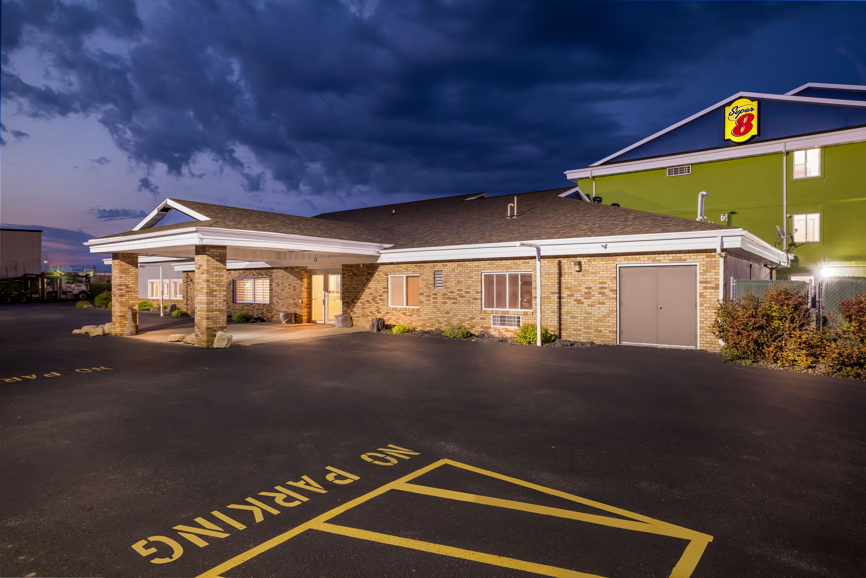 Exterior Night Image of Super 8 by Wyndham Osseo WI hotel in Osseo, Wisconsin