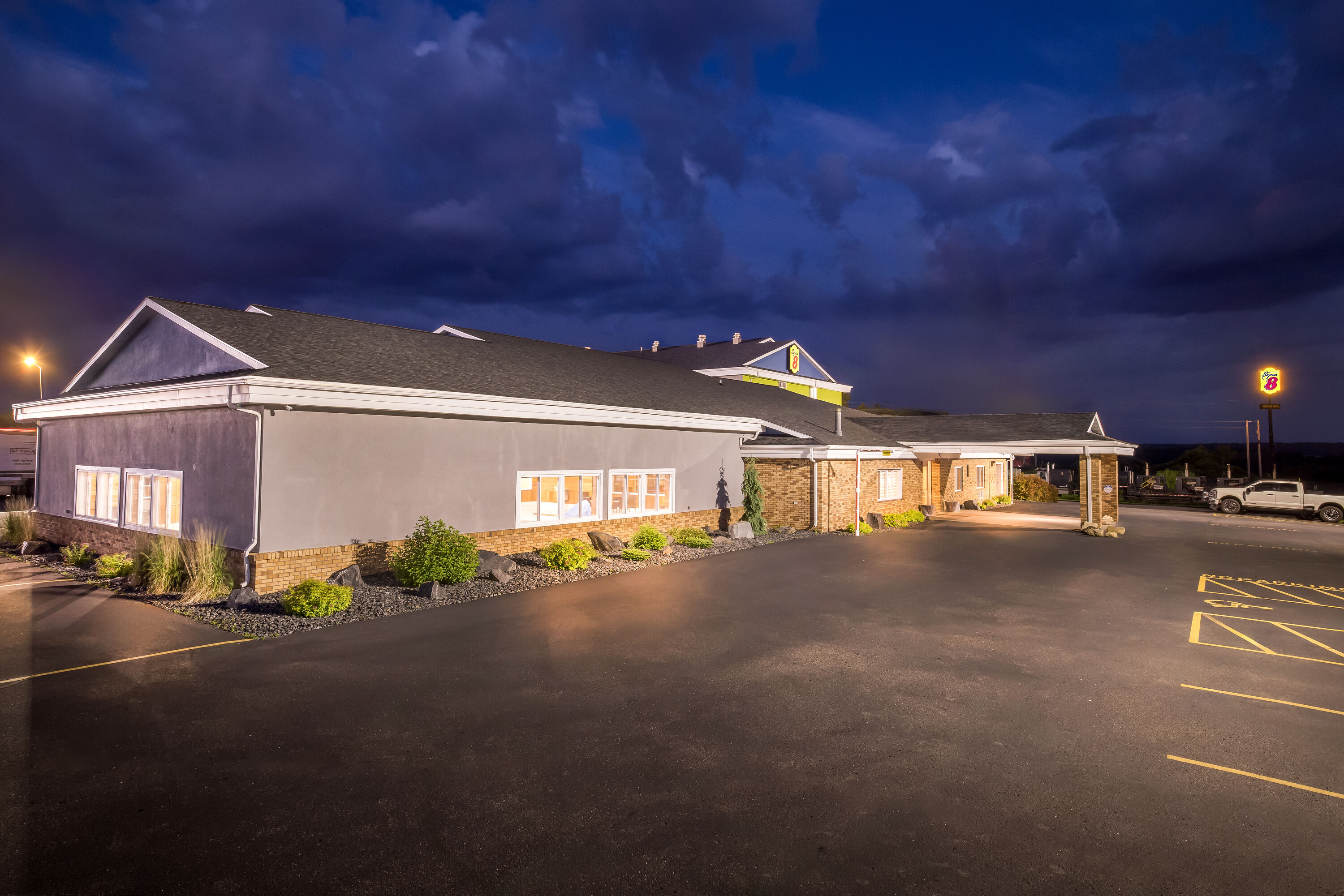 Exterior Night Image of Super 8 by Wyndham Osseo WI hotel in Osseo, Wisconsin