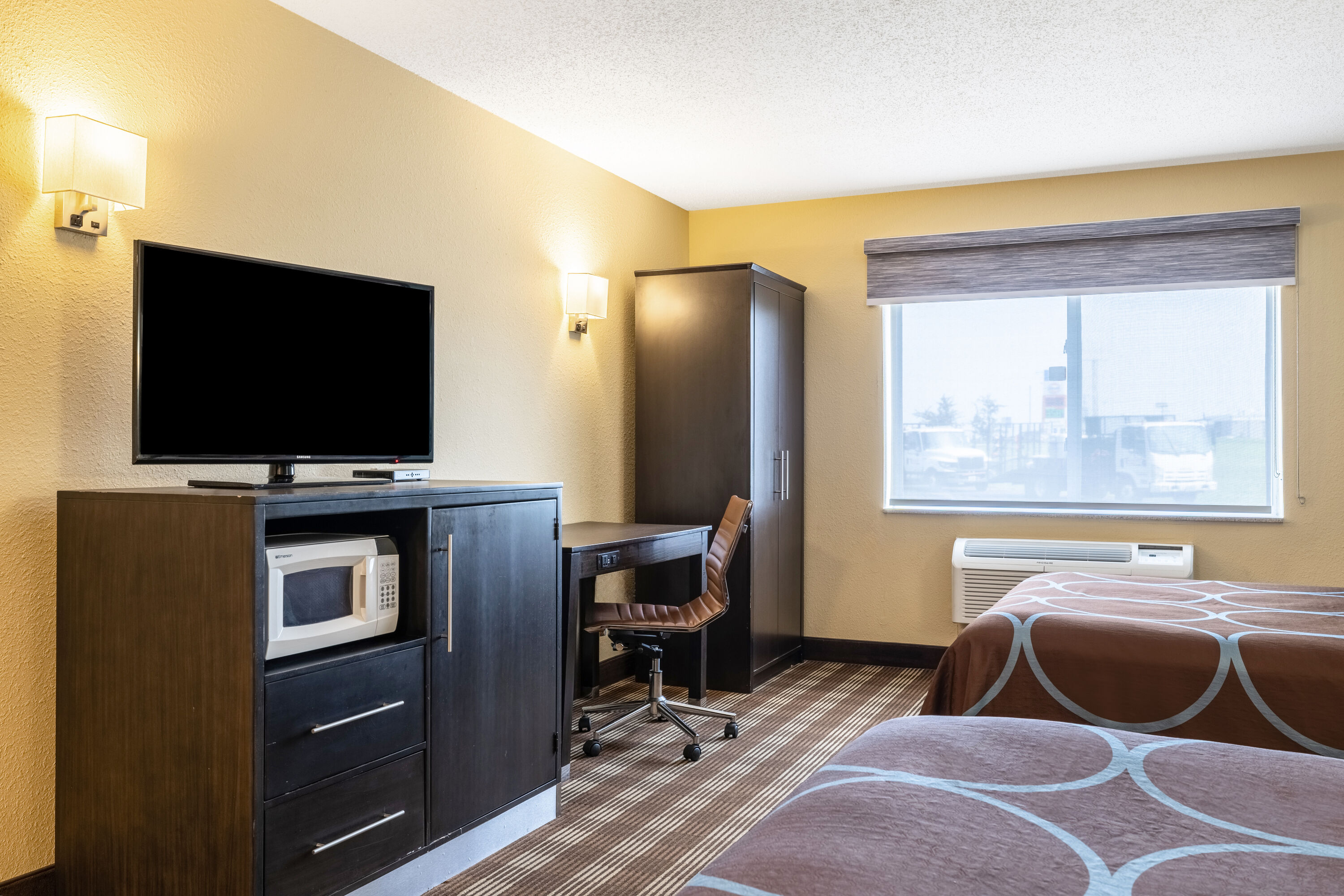 Double bed guest room at the Super 8 by Wyndham Osseo WI in Osseo, Wisconsin