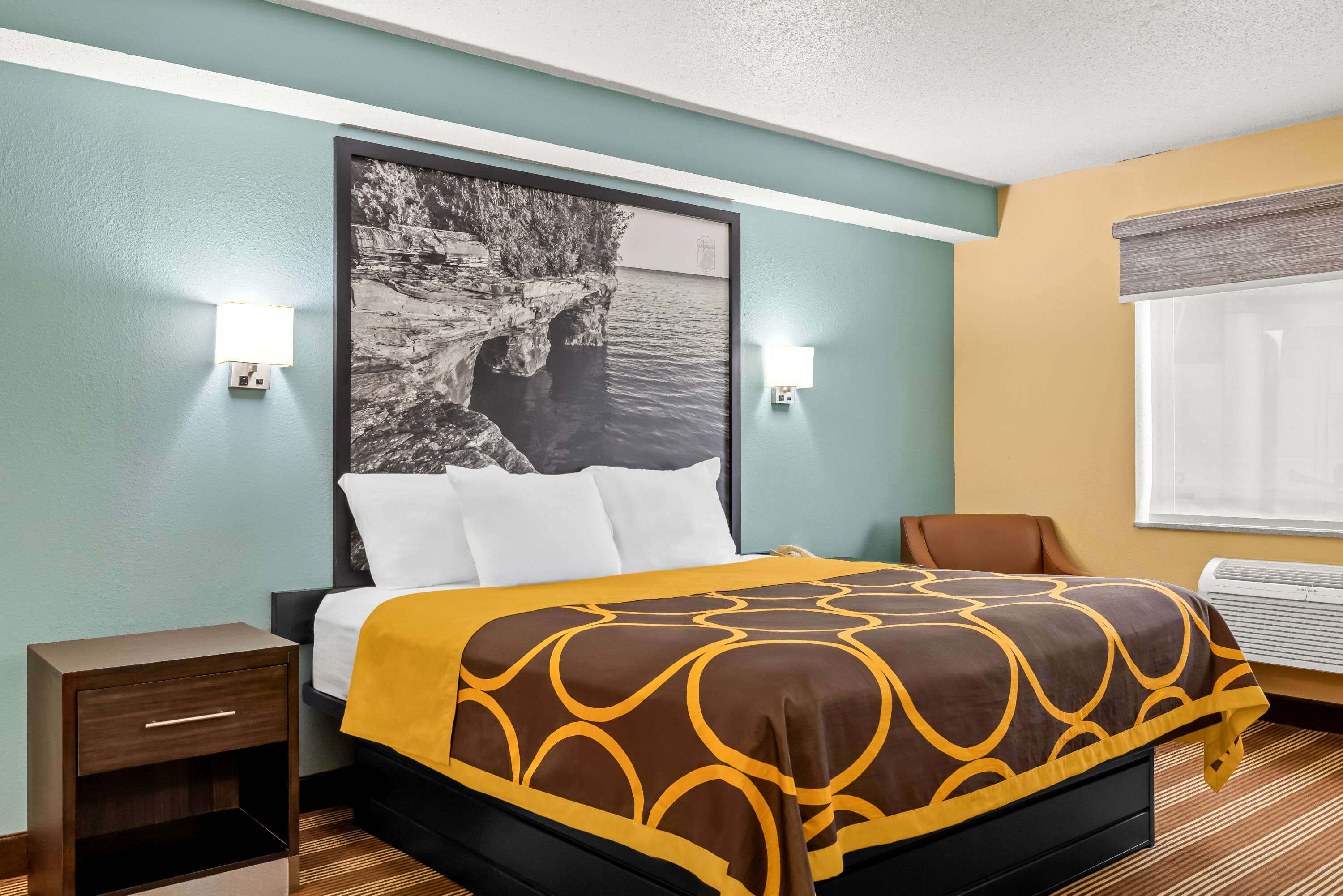 King bed guest room at the Super 8 by Wyndham Osseo WI in Osseo, Wisconsin