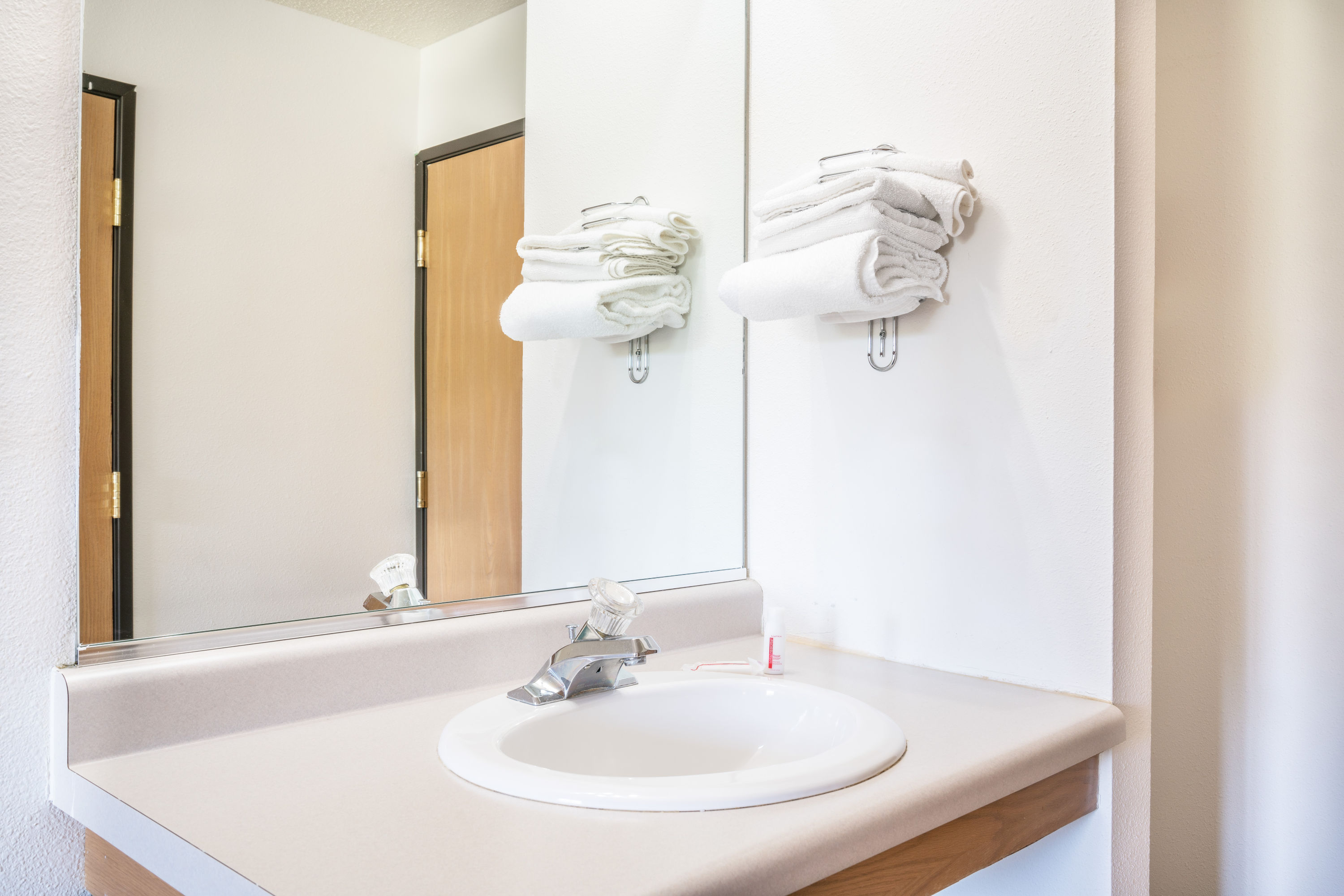 Guest room bath at the Super 8 by Wyndham Phillips in Phillips, Wisconsin