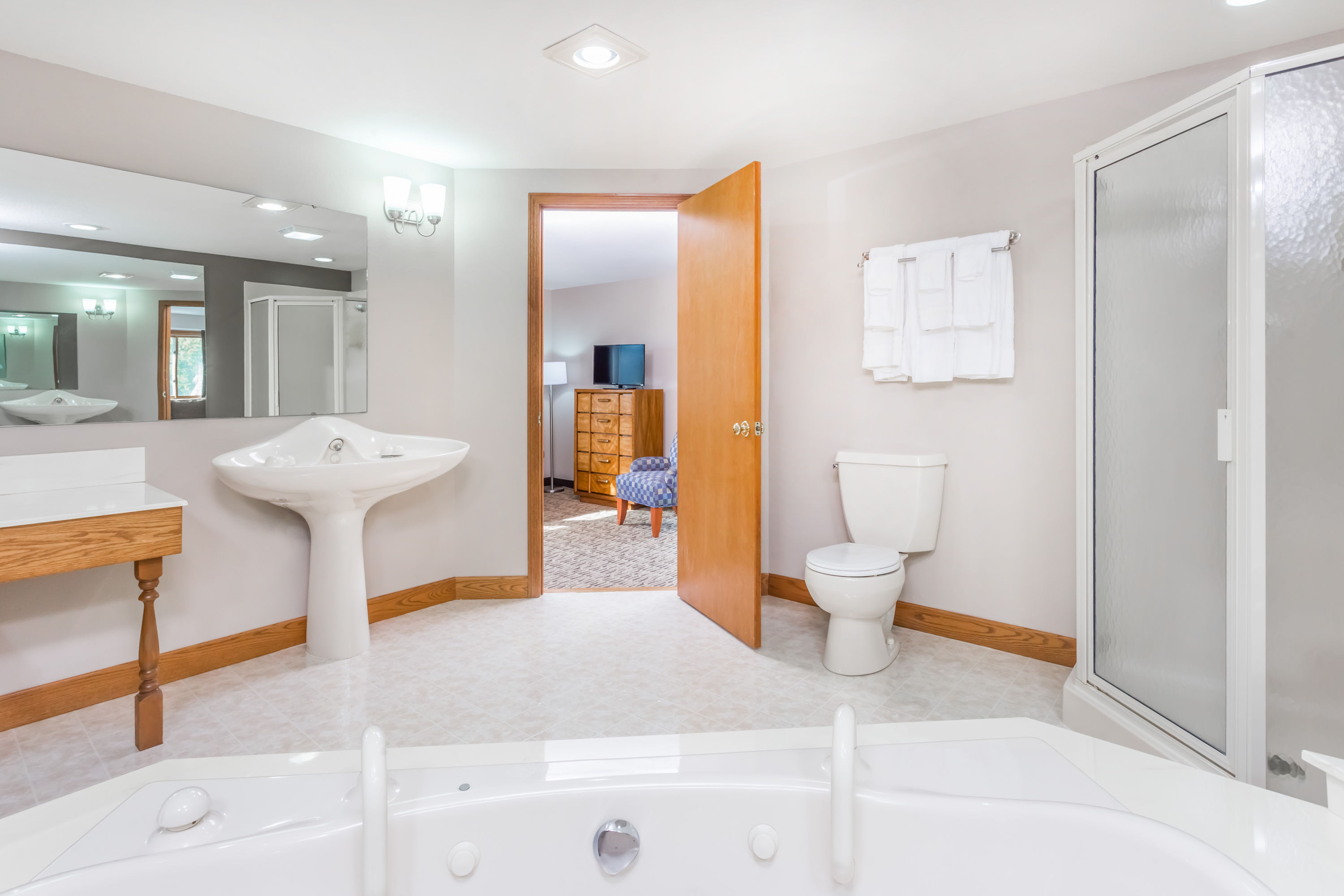 Guest room bath at the Super 8 by Wyndham Platteville in Platteville, Wisconsin