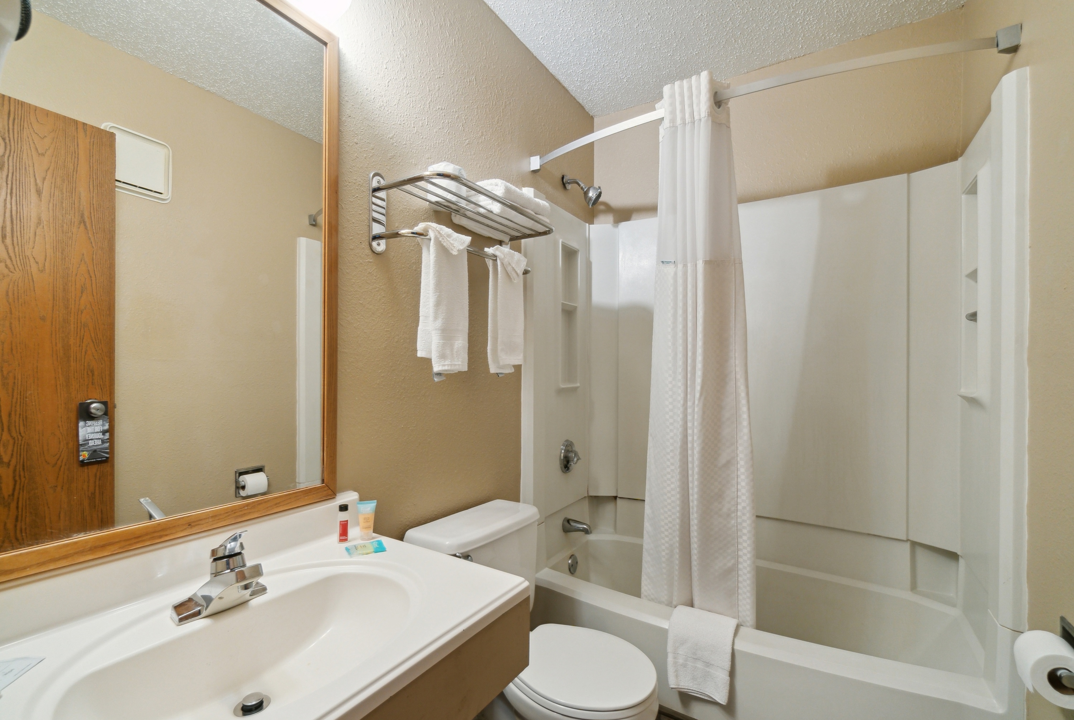 Guest room bath at the Super 8 by Wyndham Kenosha/Pleasant Prairie in Pleasant Prairie, Wisconsin