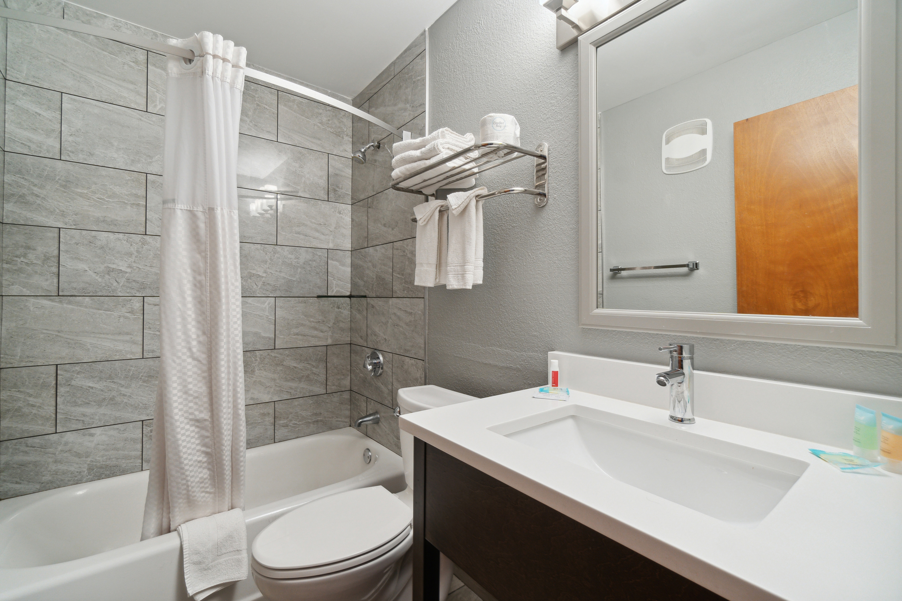 Guest room bath at the Super 8 by Wyndham Kenosha/Pleasant Prairie in Pleasant Prairie, Wisconsin